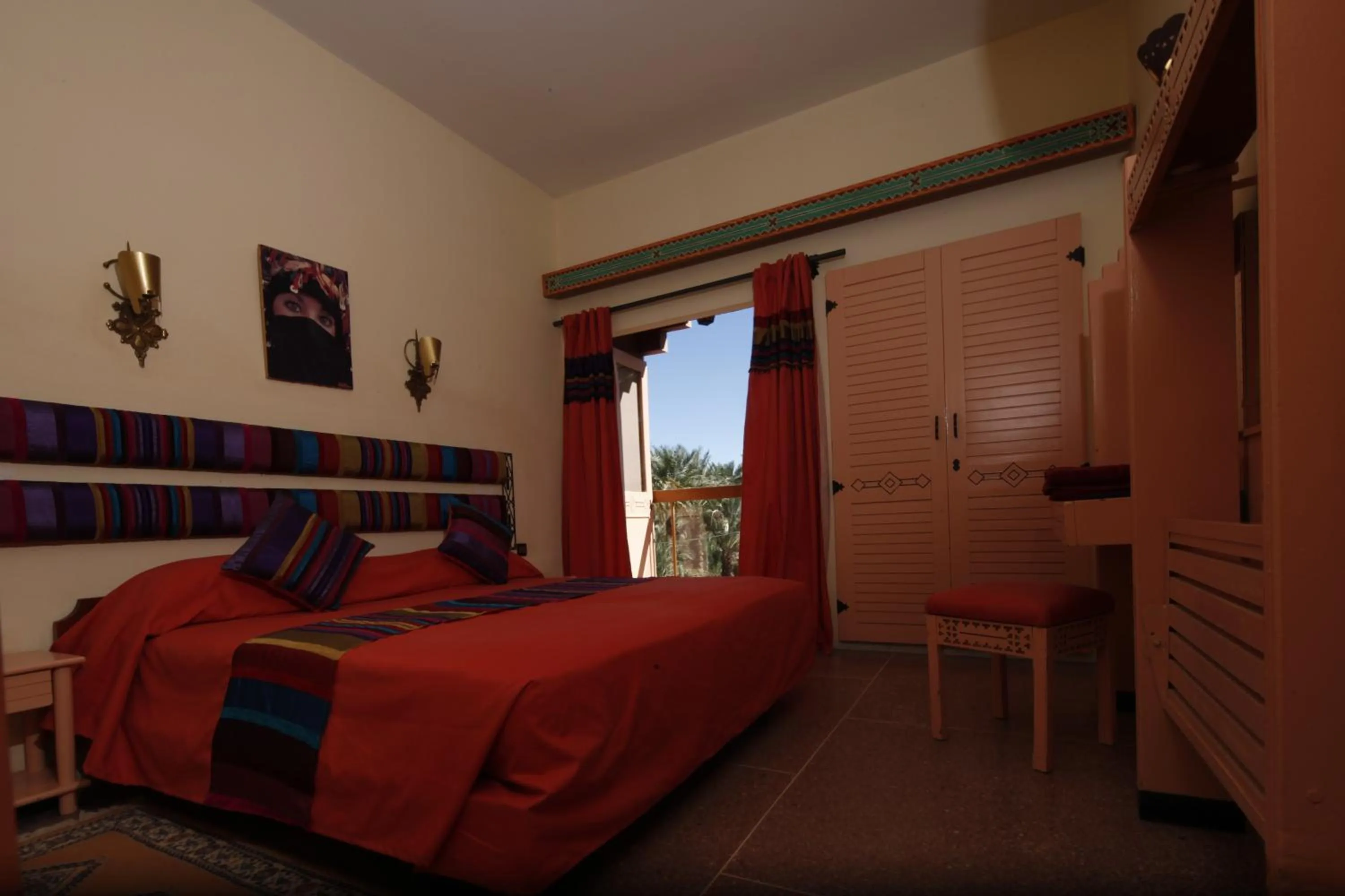 Photo of the whole room, Bed in Hôtel Le Tinsouline