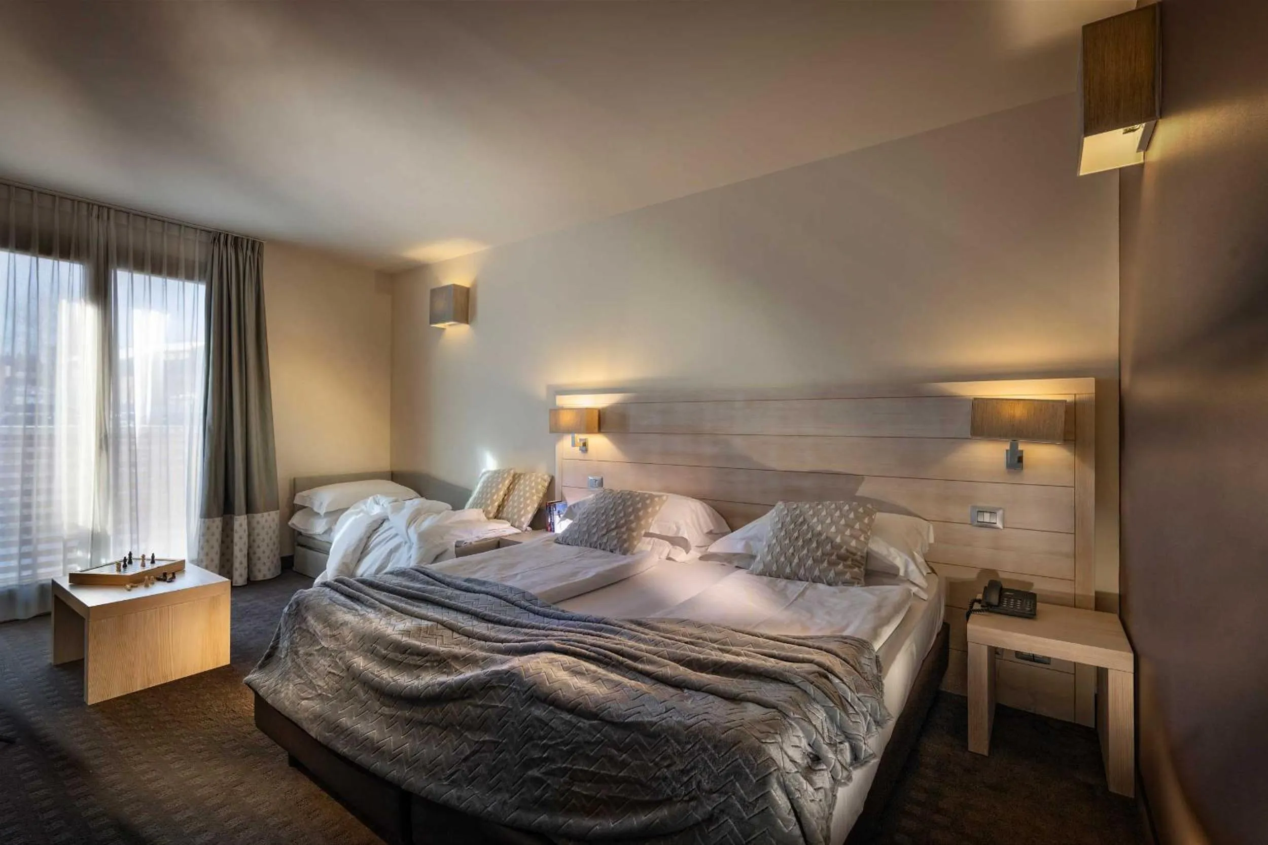 Photo of the whole room, Bed in Brenta Dolomites