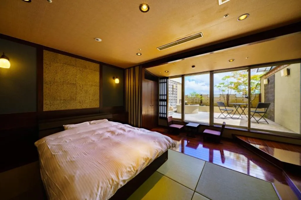 Bed in Hotel Beppu Pastoral