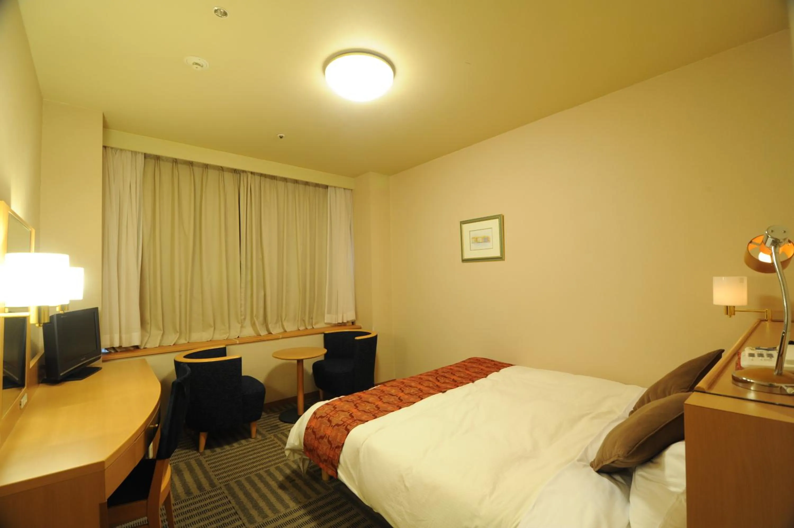 Photo of the whole room, Bed in Yamagata Eki Nishiguchi Washington Hotel