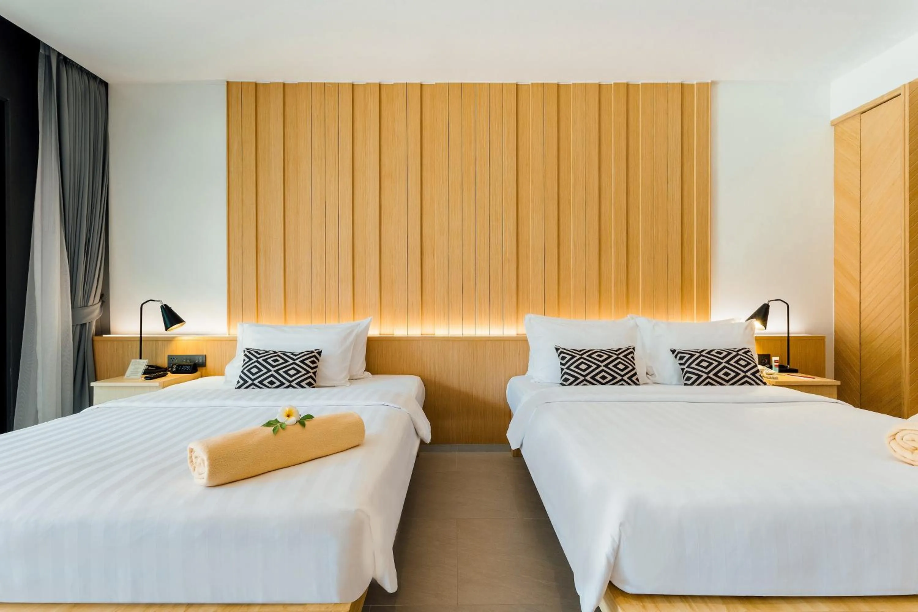 Bed in Ramada Resort by Wyndham Khao Lak