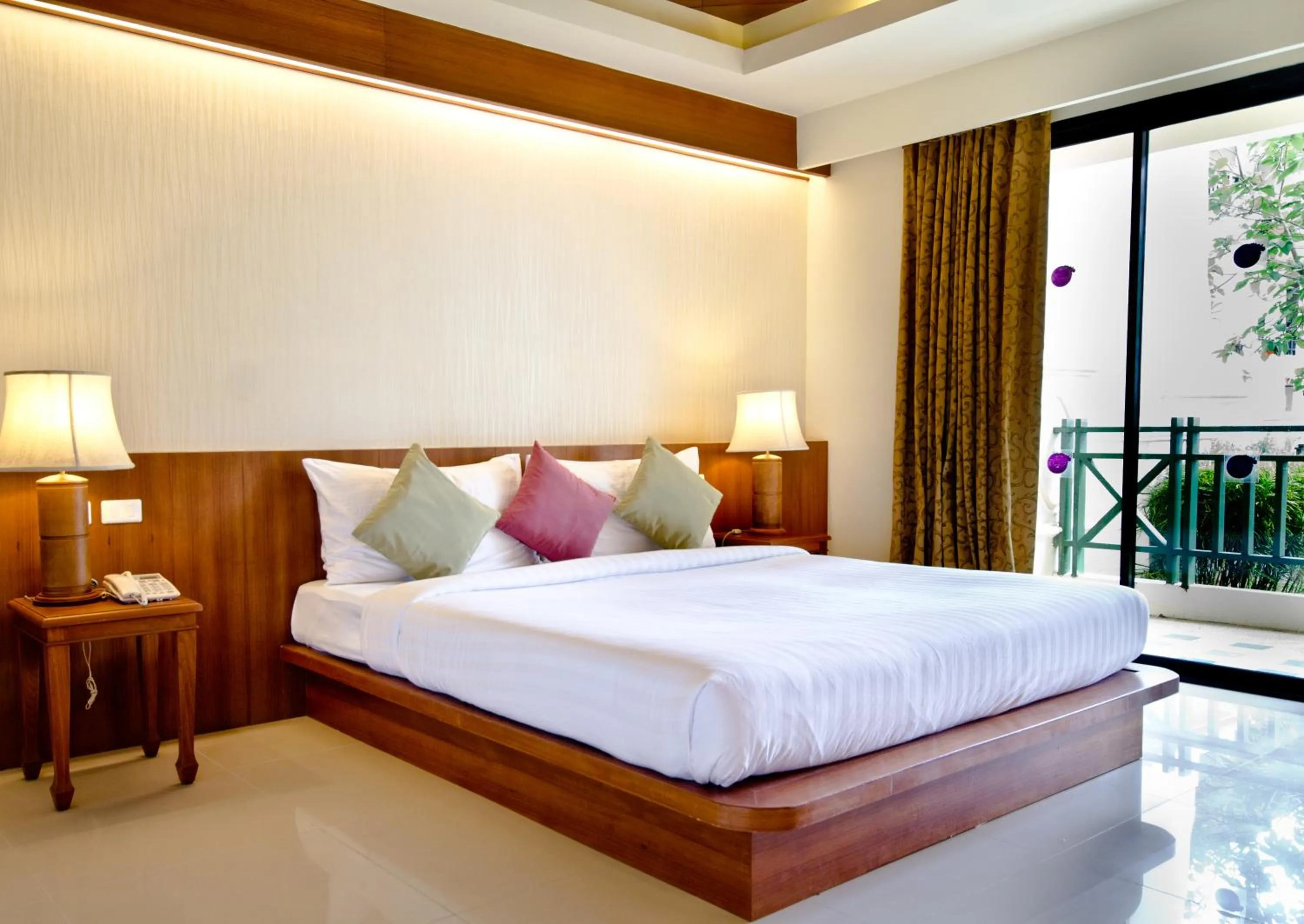 Bed in Khaolak Orchid Beach Resort - SHA Extra Plus