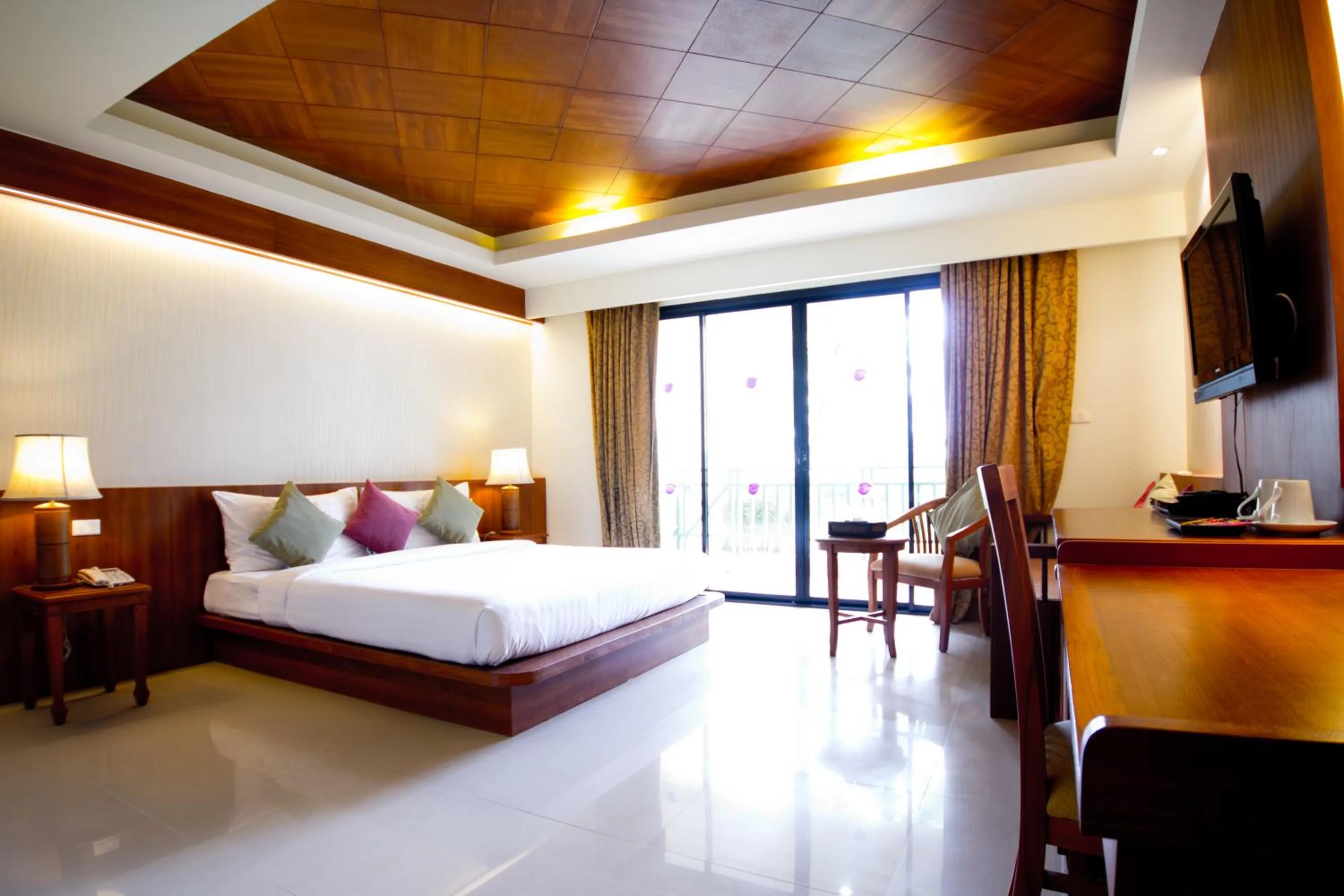 Bed in Khaolak Orchid Beach Resort - SHA Extra Plus