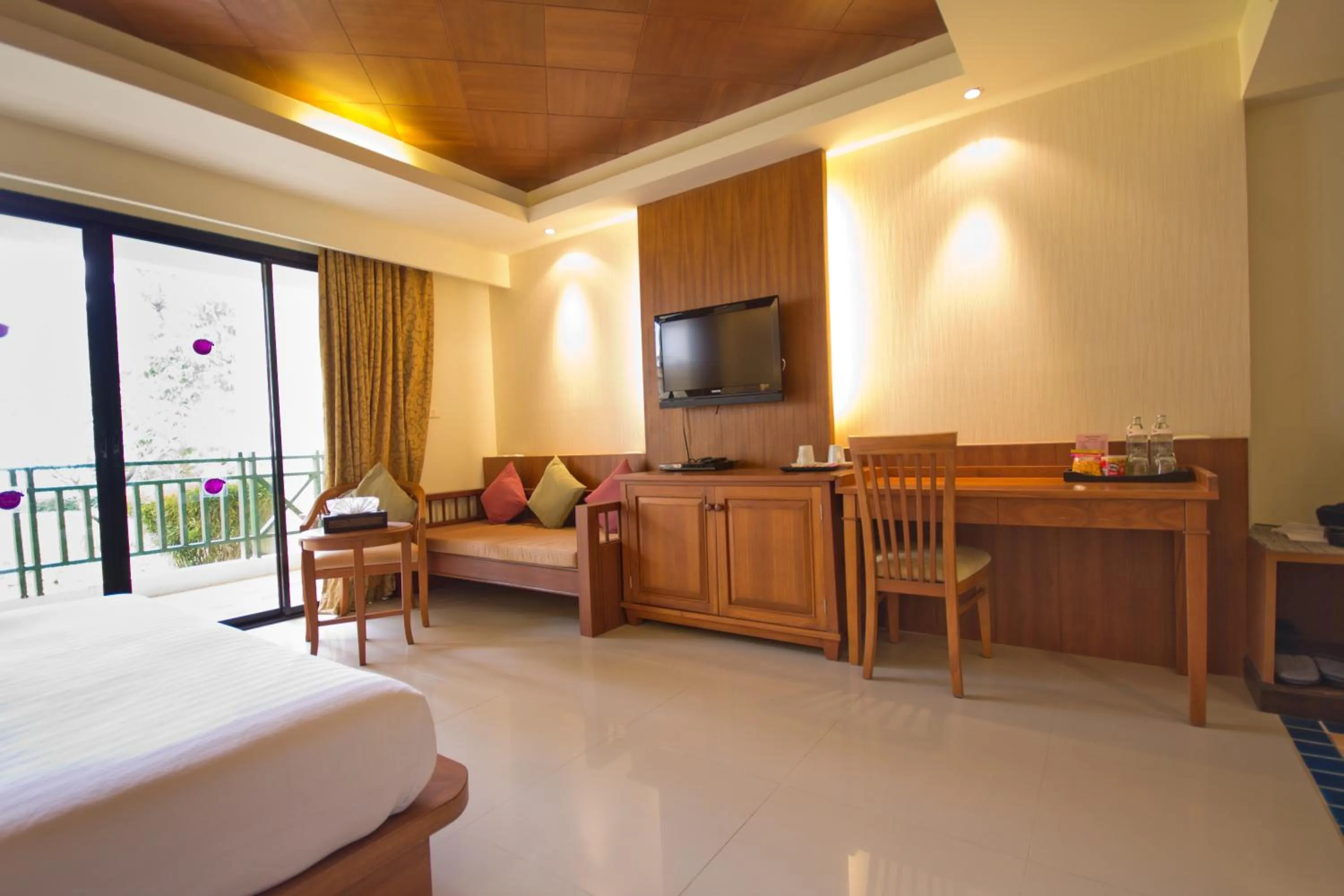 Bed in Khaolak Orchid Beach Resort - SHA Extra Plus