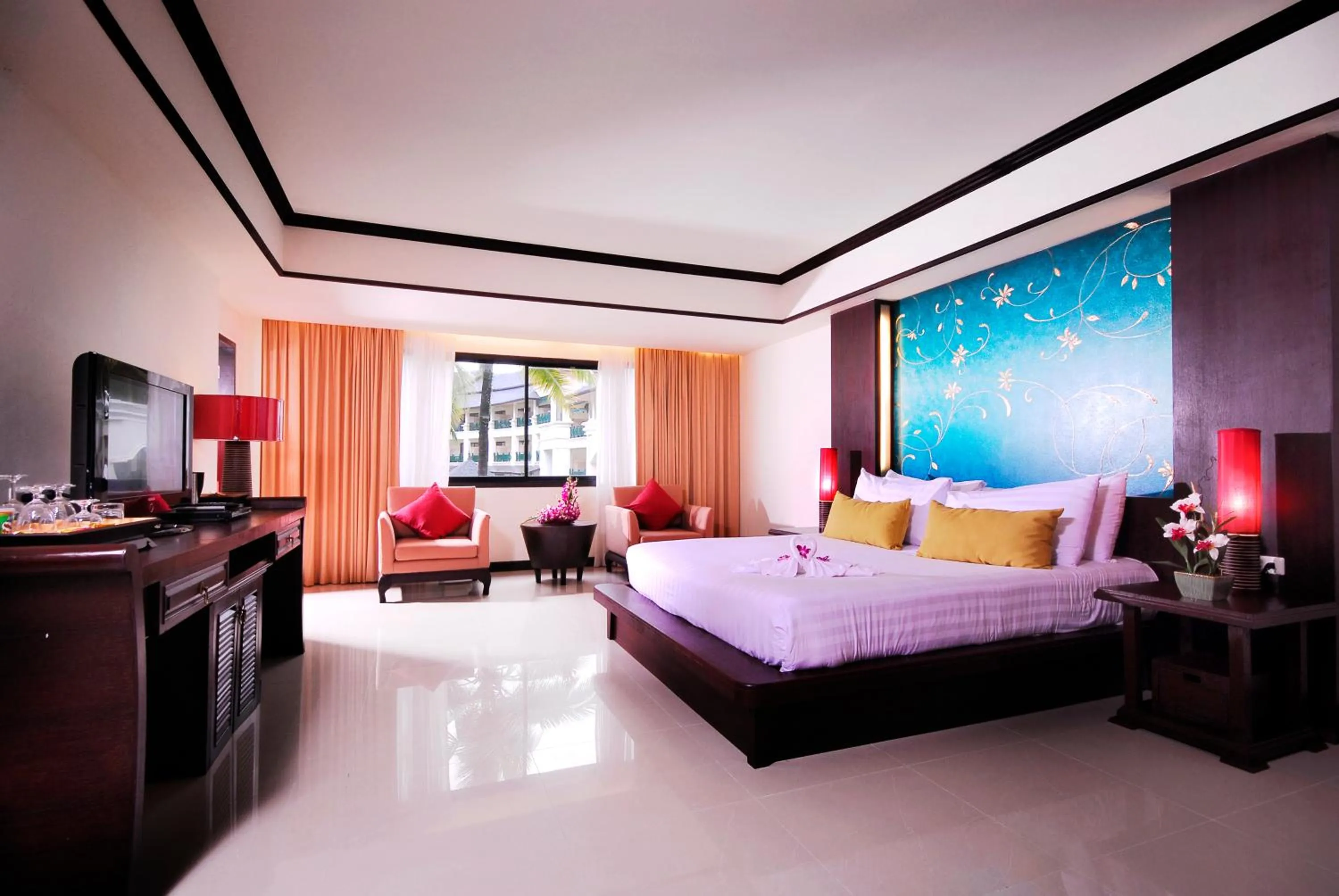 Bed in Khaolak Orchid Beach Resort - SHA Extra Plus