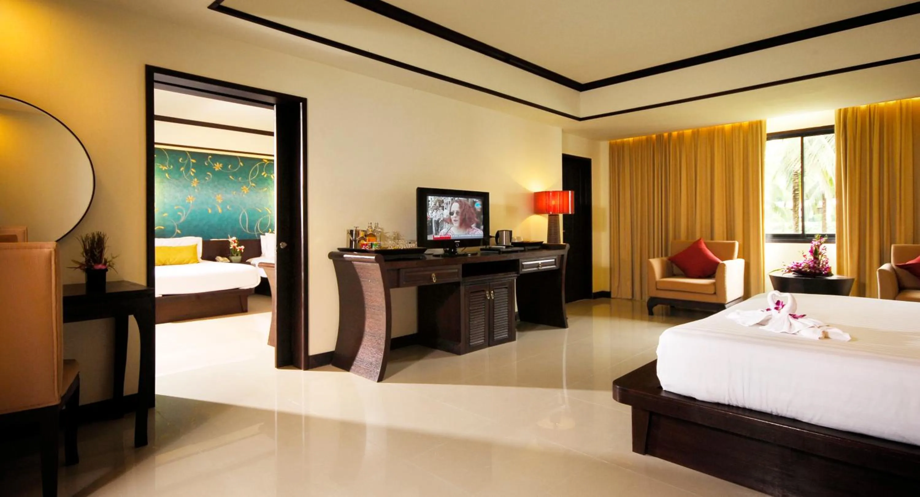 Bed in Khaolak Orchid Beach Resort - SHA Extra Plus
