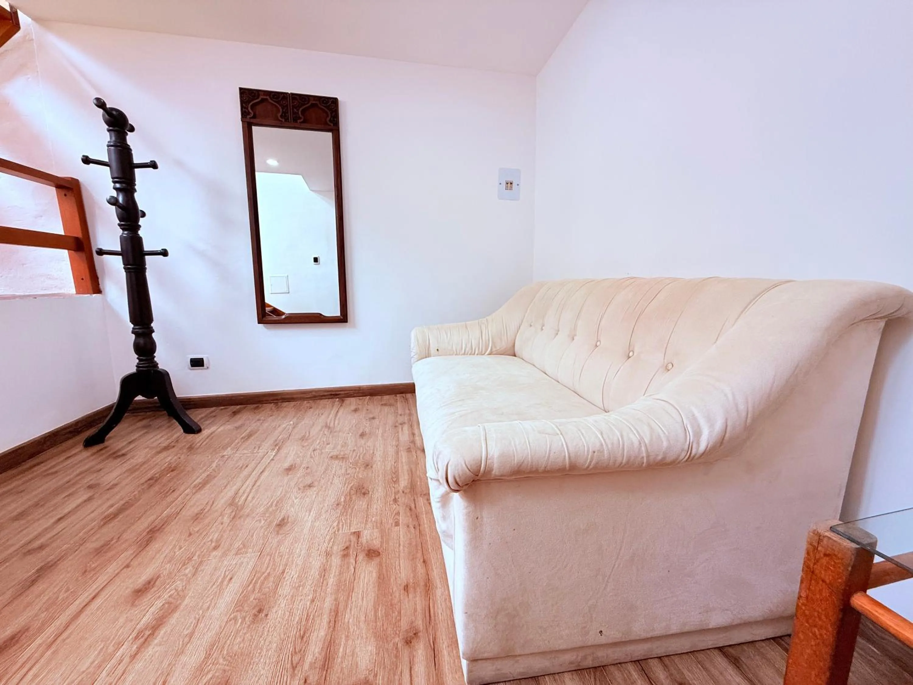 Living room, Bed in Apartaestudios La Candelaria