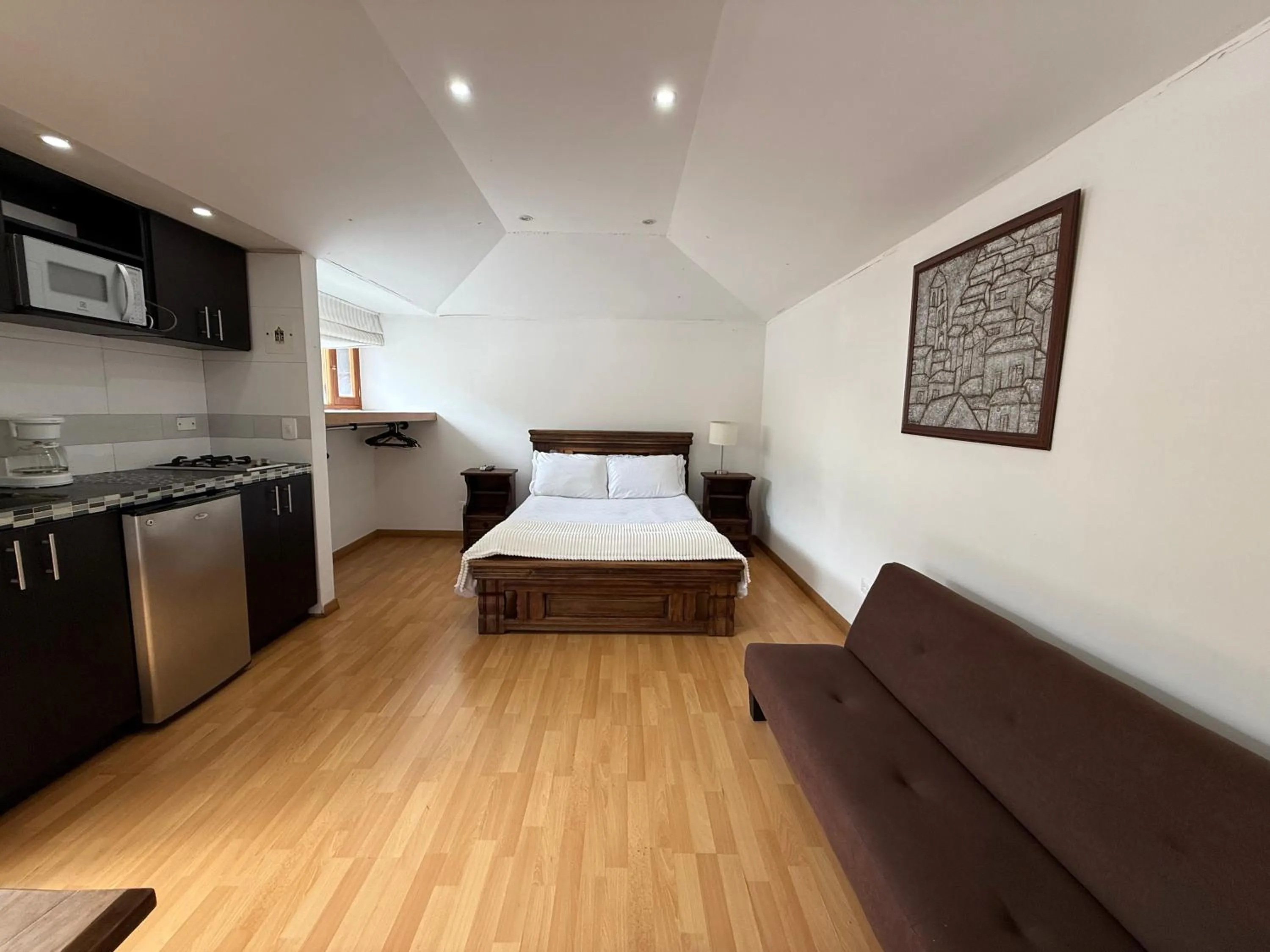 Photo of the whole room, Bed in Apartaestudios La Candelaria