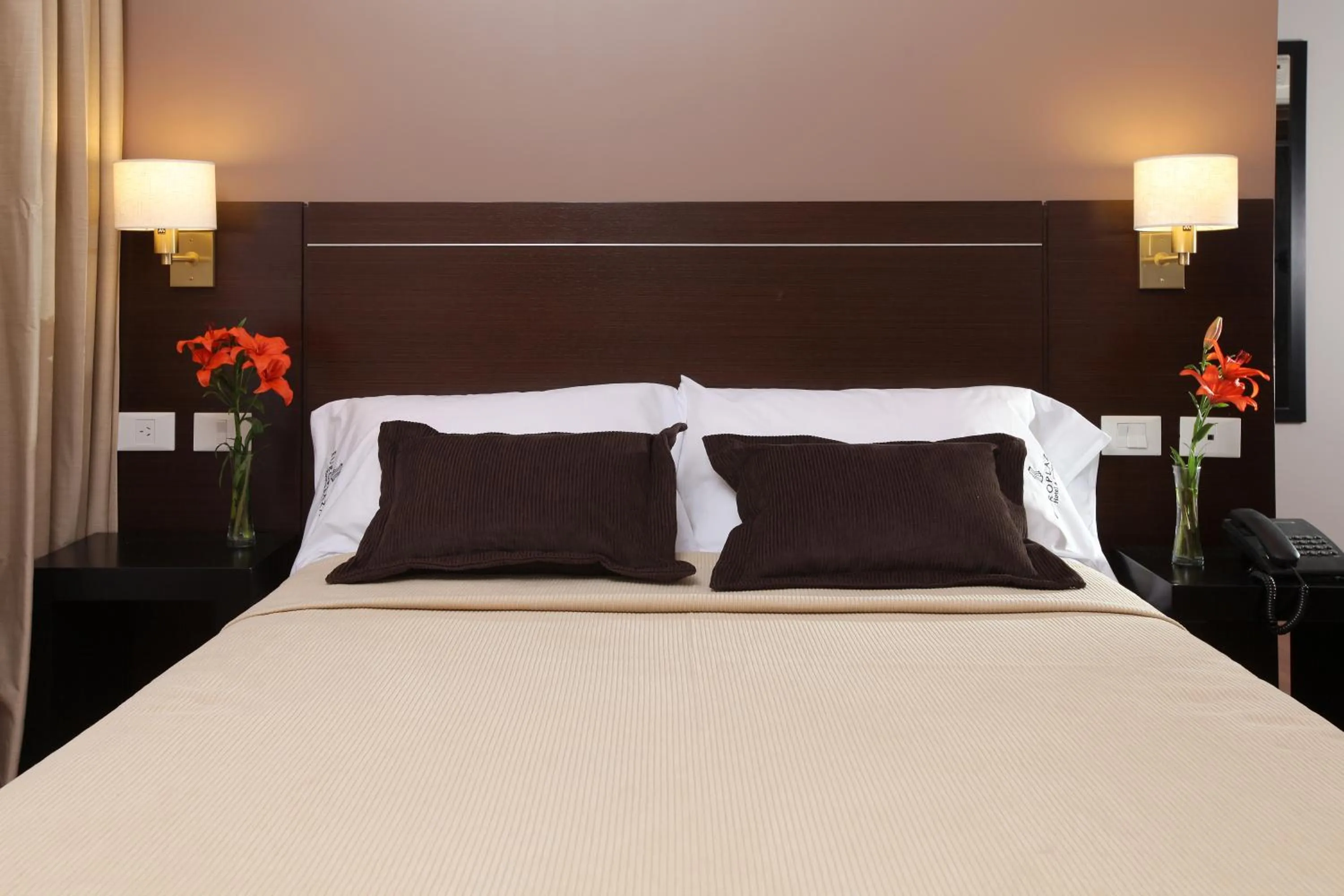 Bed in Europlaza Hotel & Suites