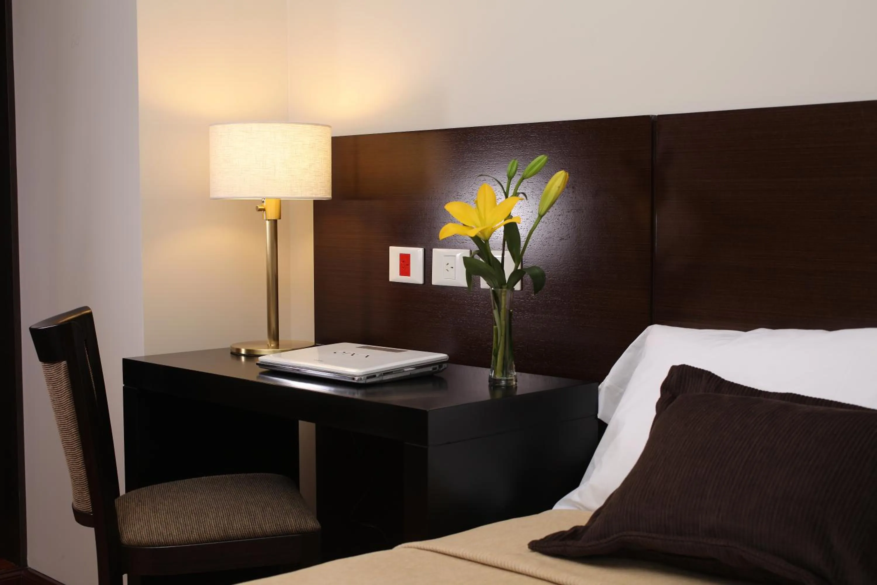 Bed in Europlaza Hotel & Suites