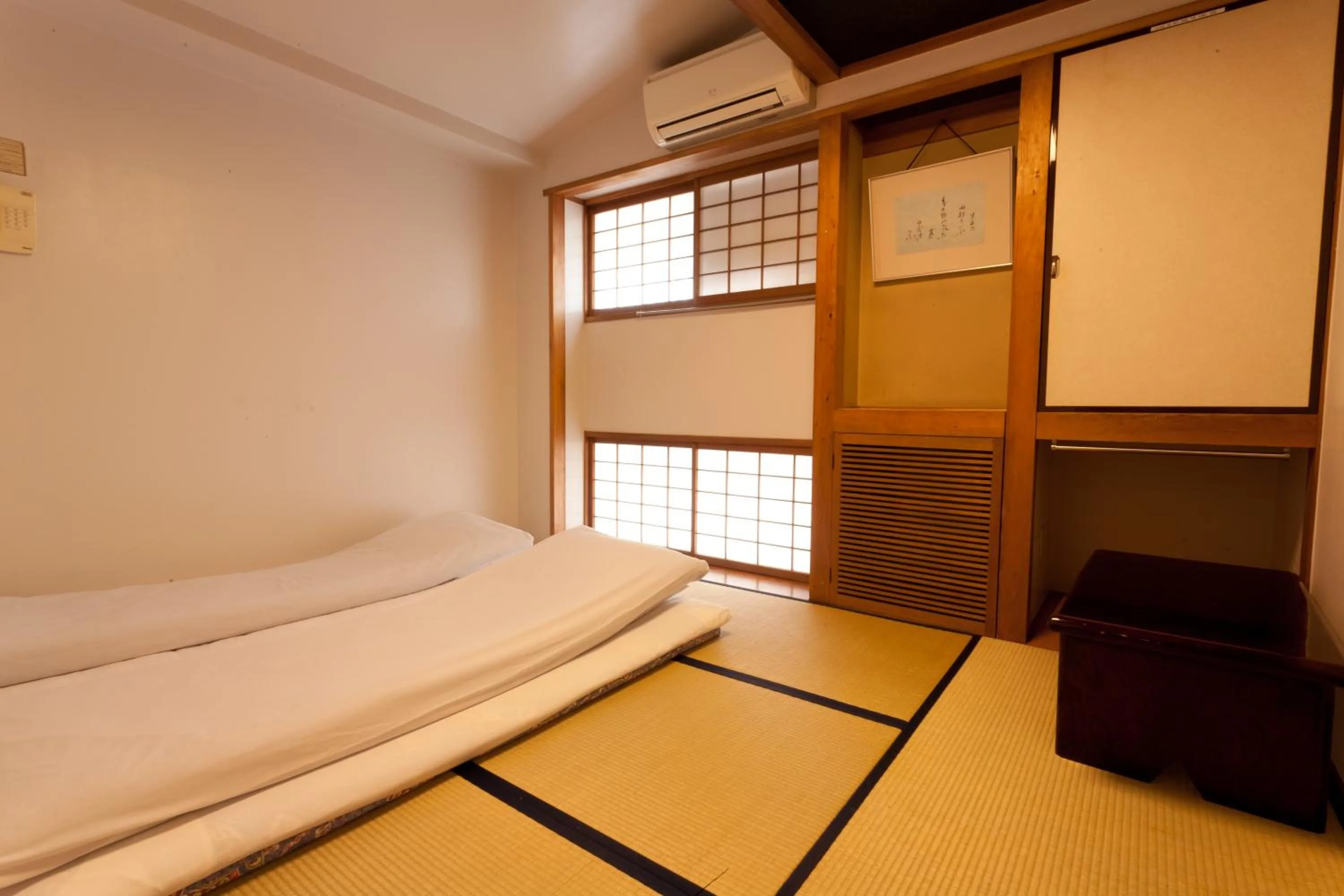 Photo of the whole room, Bed in Kimi Ryokan