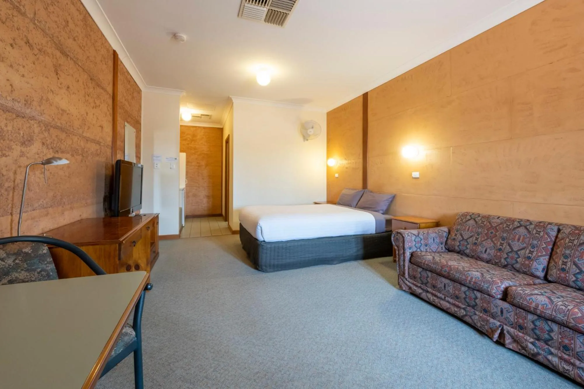 Bed in Mud Hut Motel