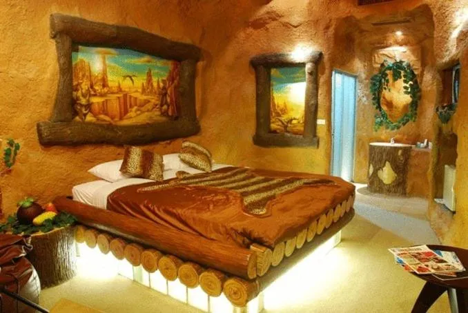 Bed in The Adventure Hotel
