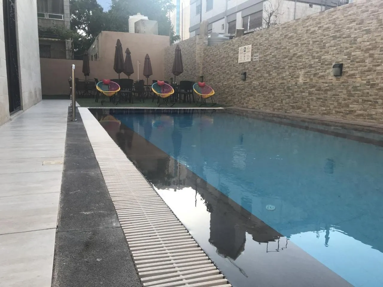 Swimming pool in Almond Hotel Apartments