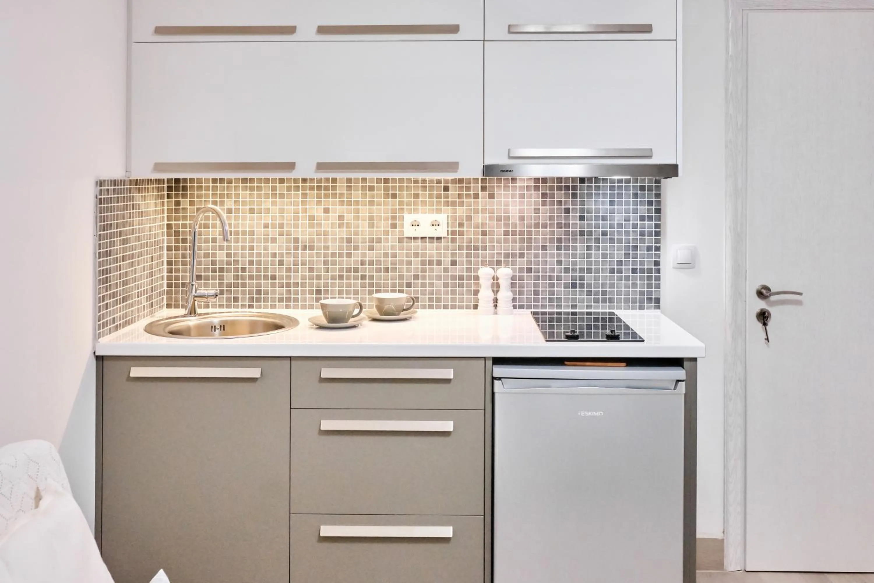 Kitchen or kitchenette in Villa Mare Monte ApartHotel