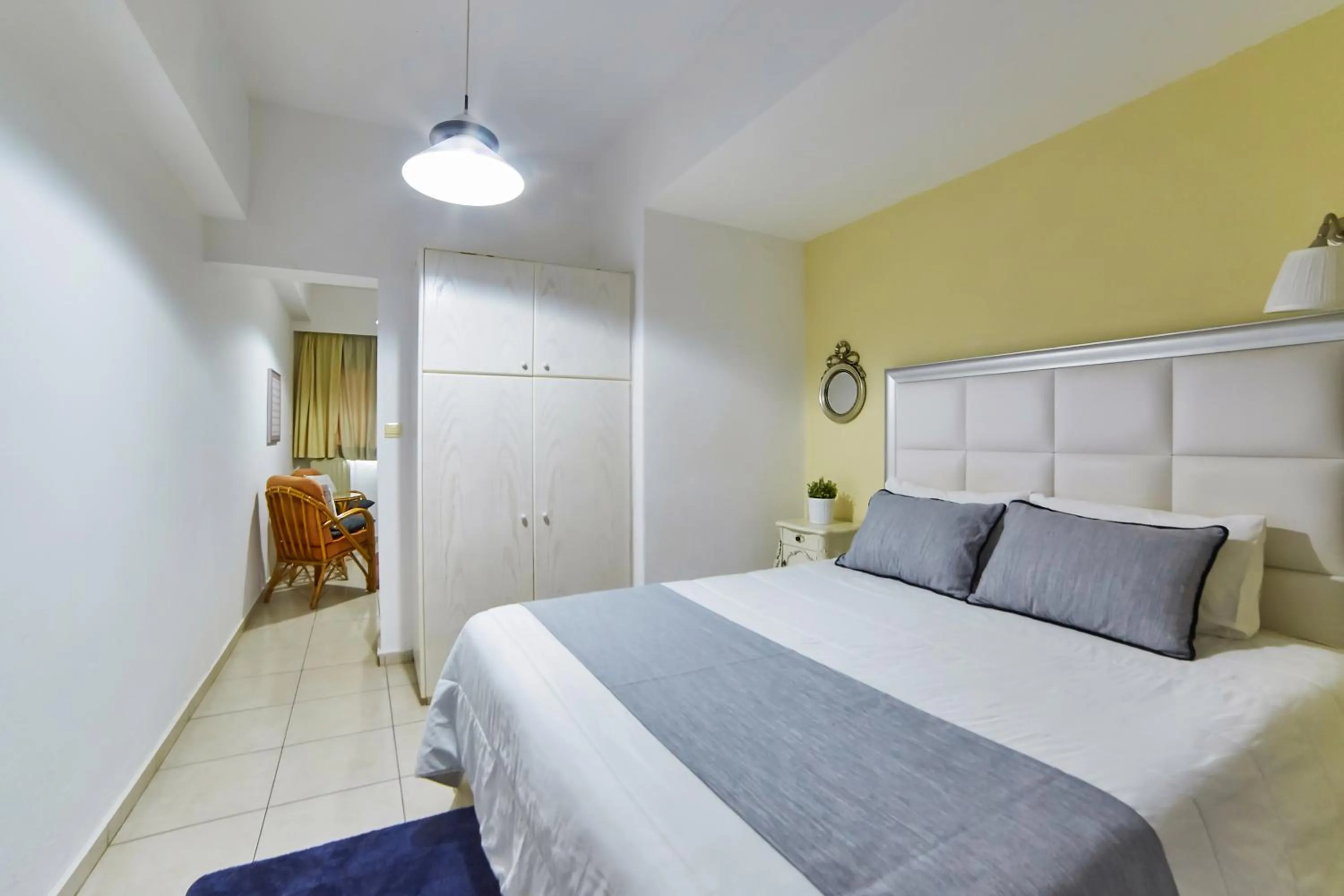 Seating area, Bed in Villa Mare Monte ApartHotel