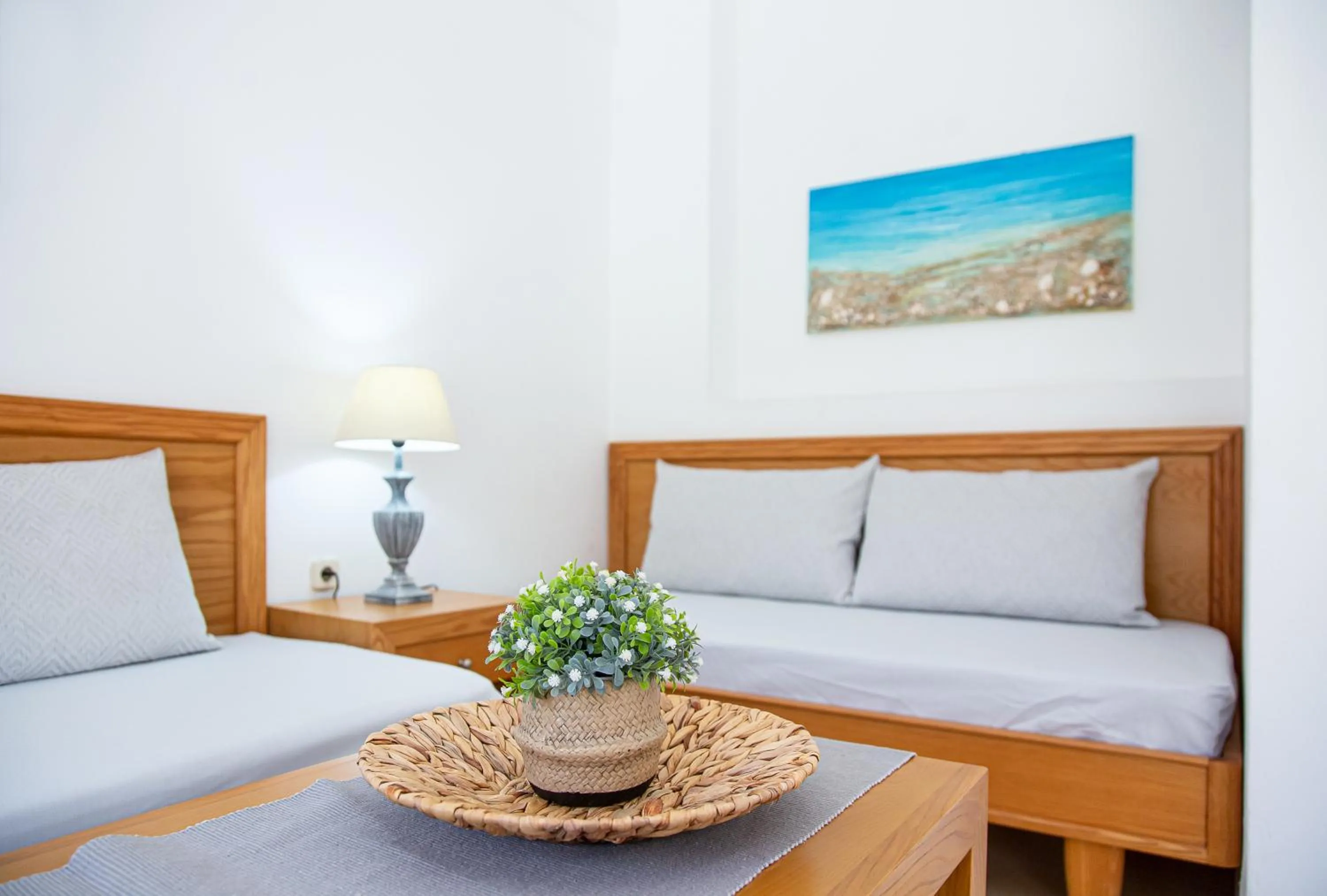 Living room, Bed in Villa Mare Monte ApartHotel