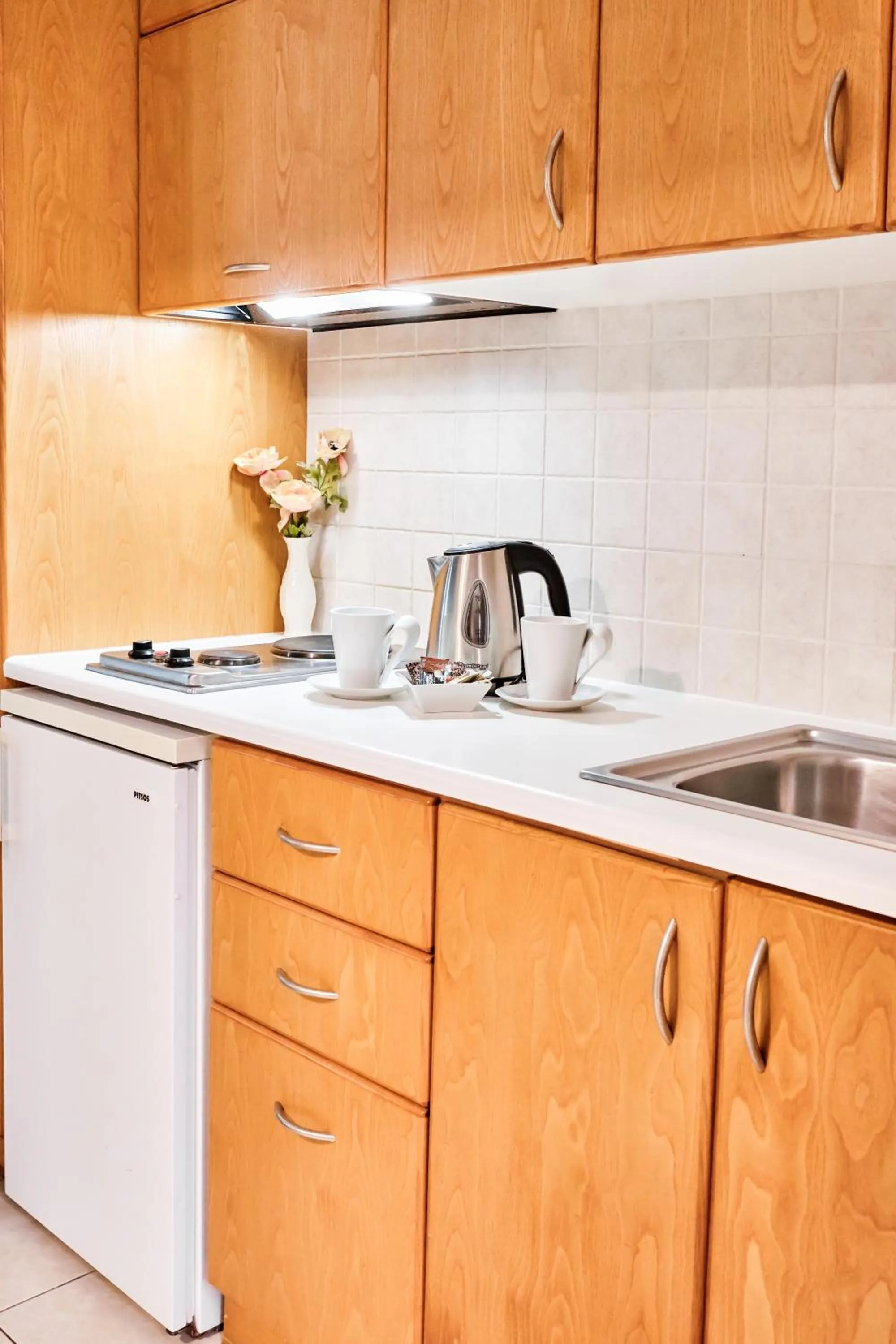 Kitchen or kitchenette in Villa Mare Monte ApartHotel