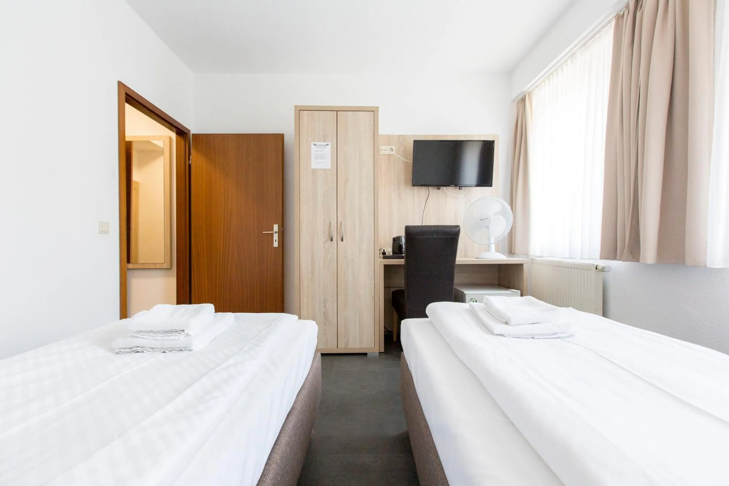 TV and multimedia, Bed in Hotel-Pension ODIN