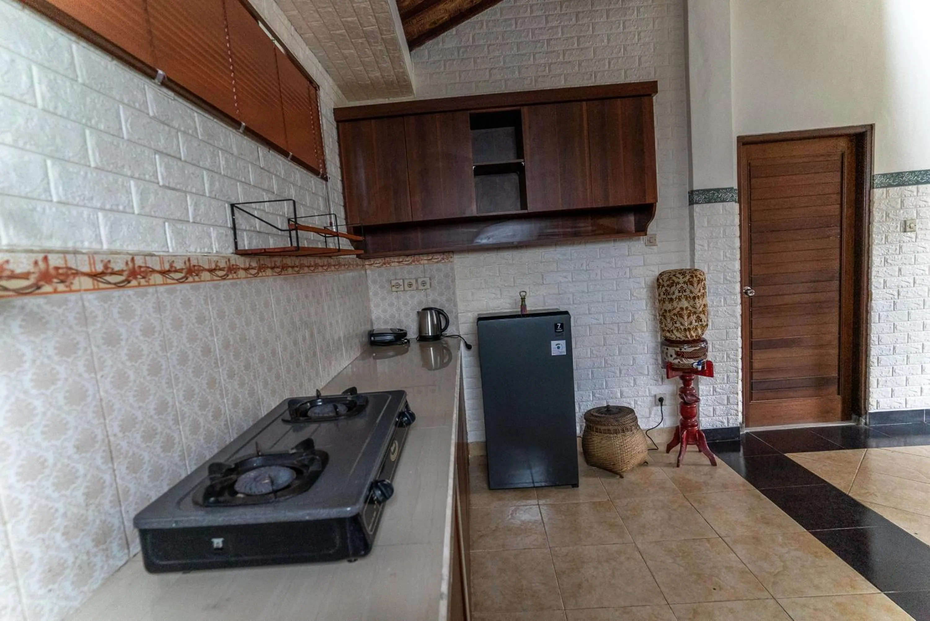 Kitchen or kitchenette in Capung Cottages