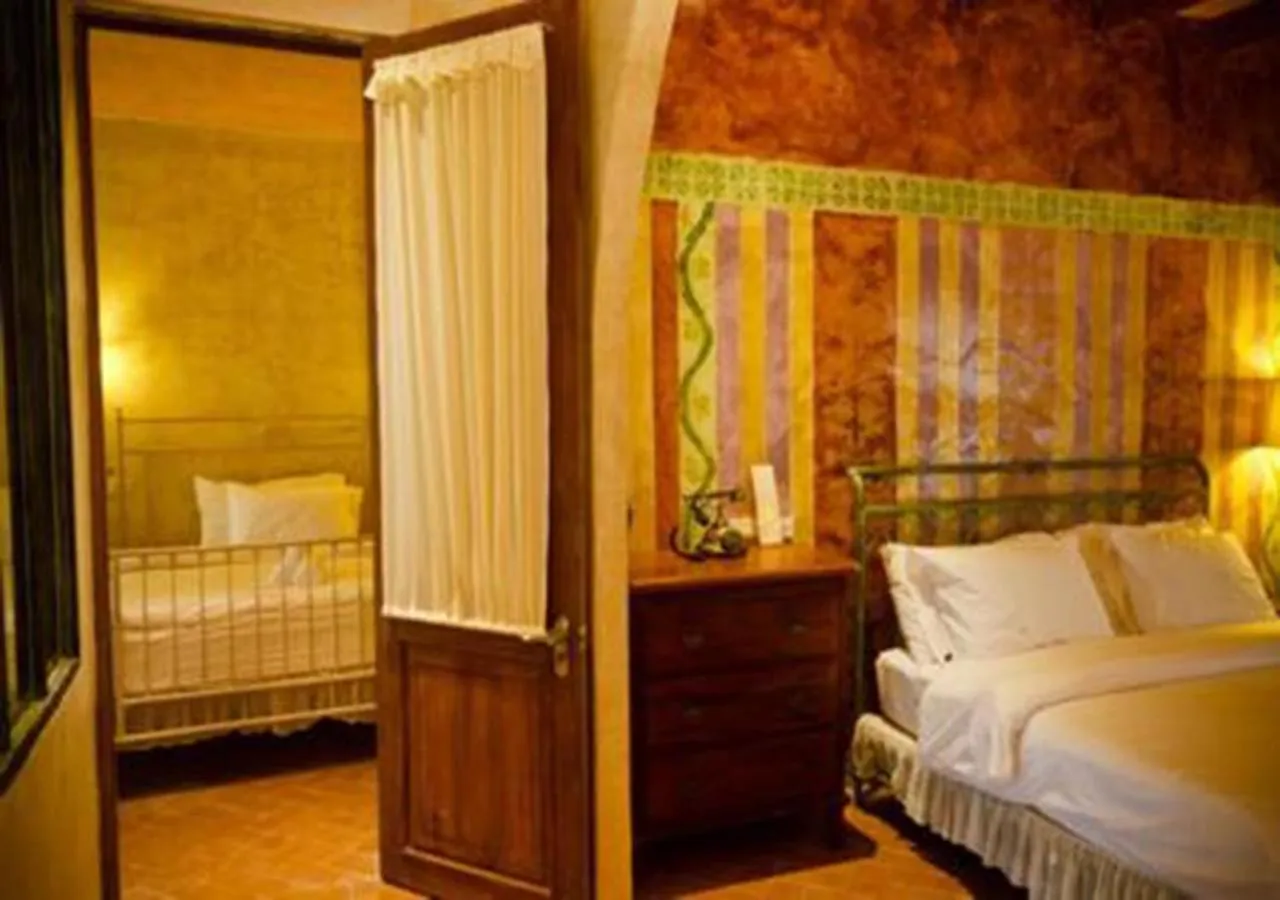Photo of the whole room, Bed in La Toscana