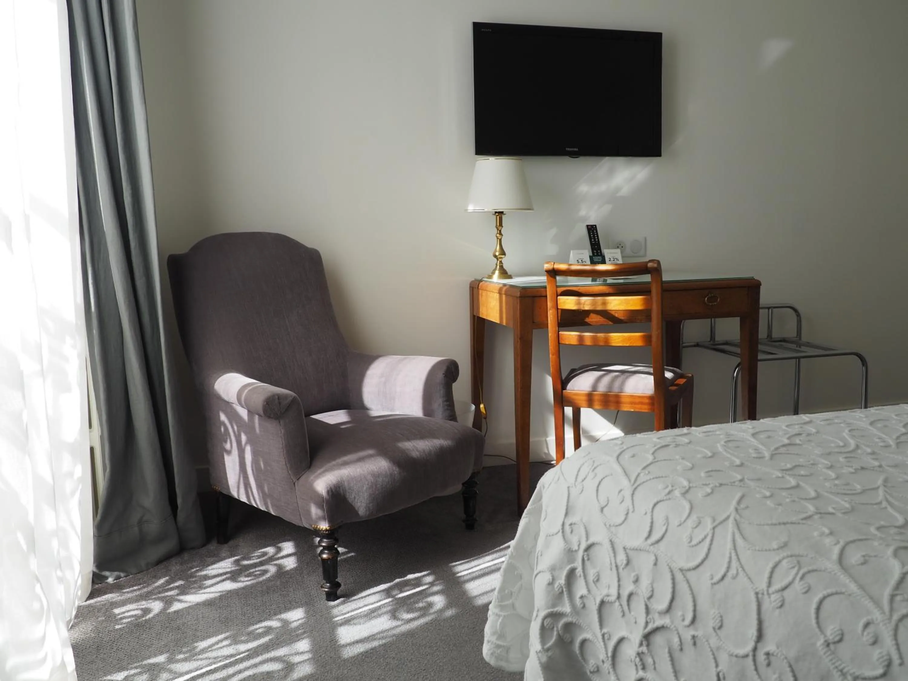 Bedroom in Logis Hotel Royal Saint-Mart