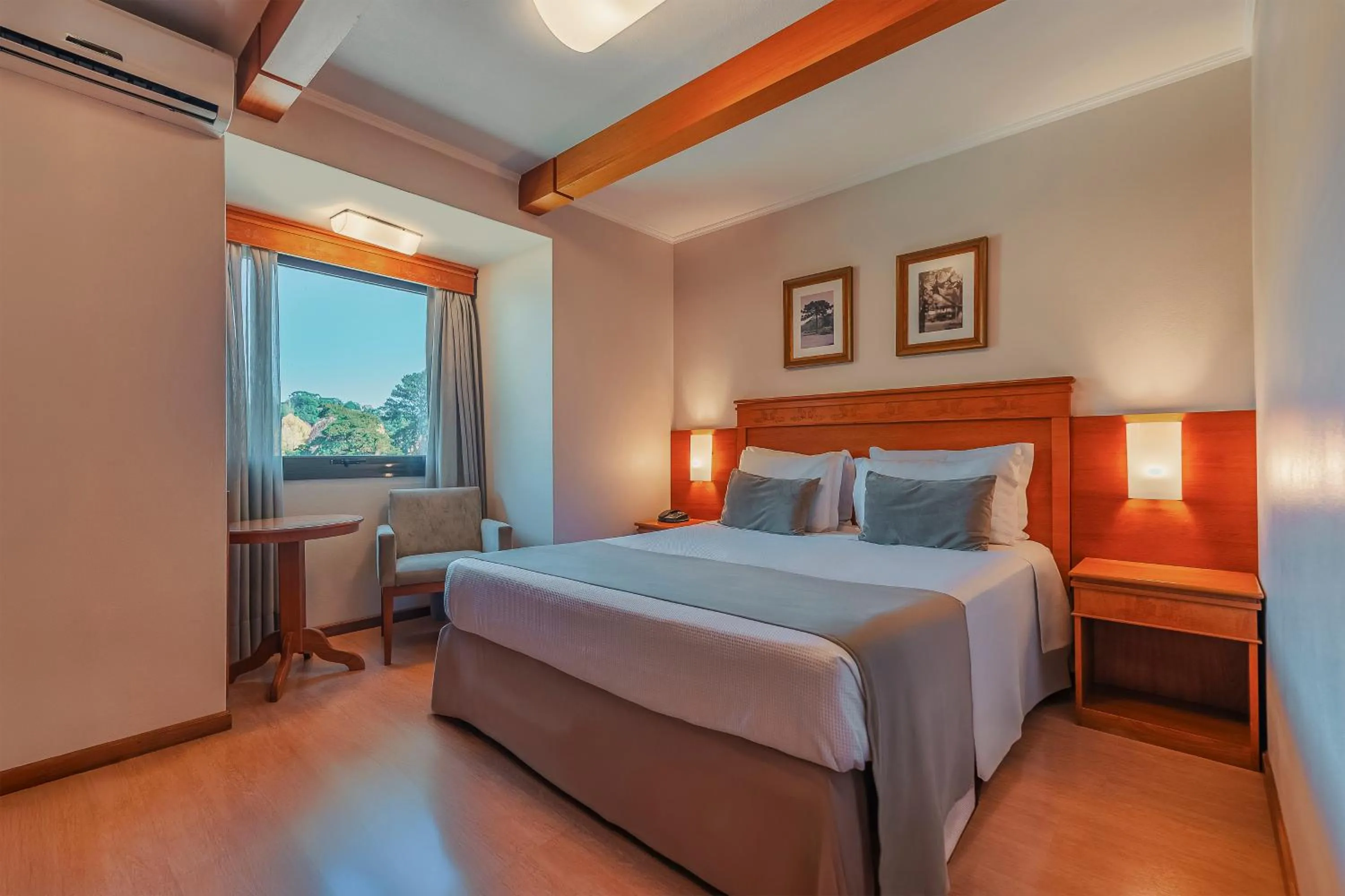 Bed in Hotel Laghetto Premio