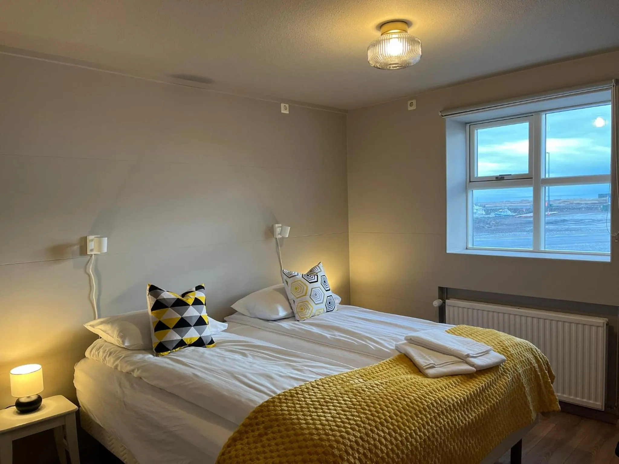 Seating area, Bed in Guesthouse Hvammur by the Harbour