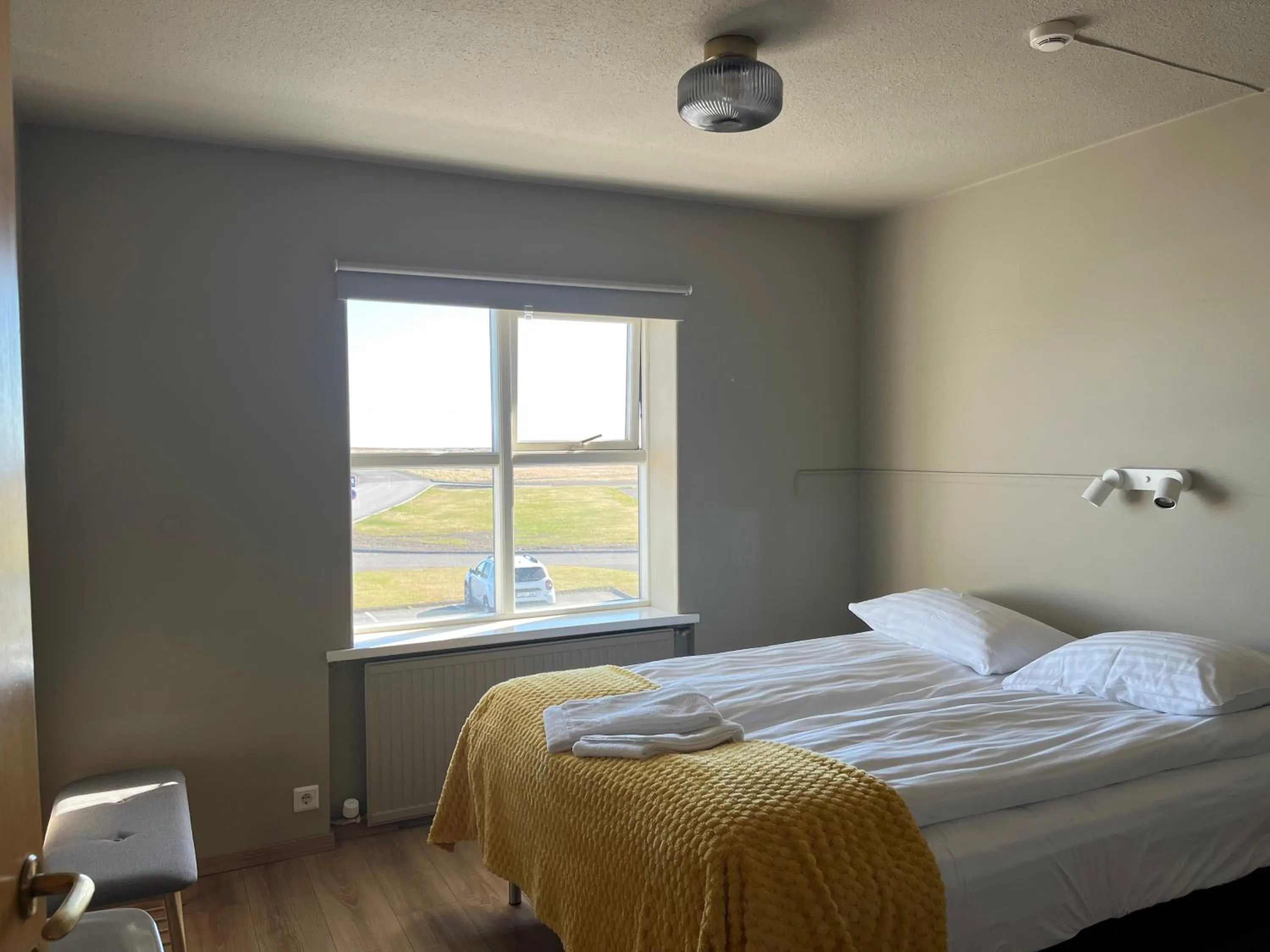 Bed in Guesthouse Hvammur by the Harbour