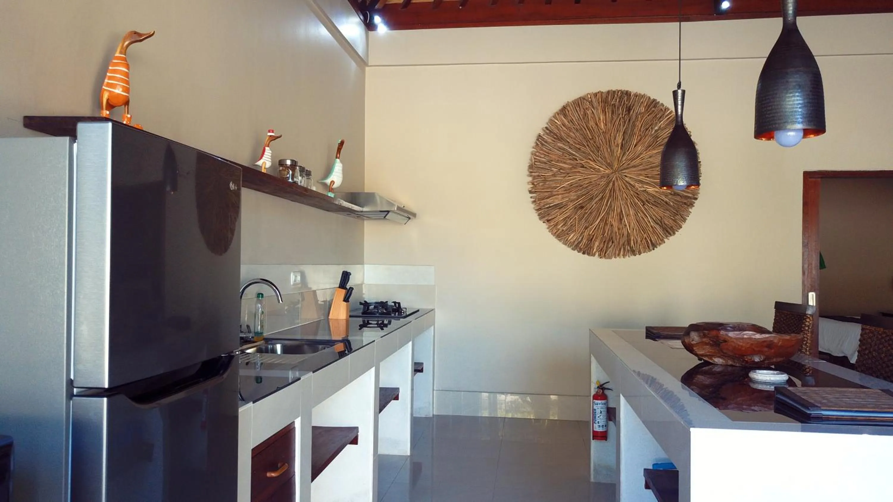 Kitchen or kitchenette in Gili Palms Villas