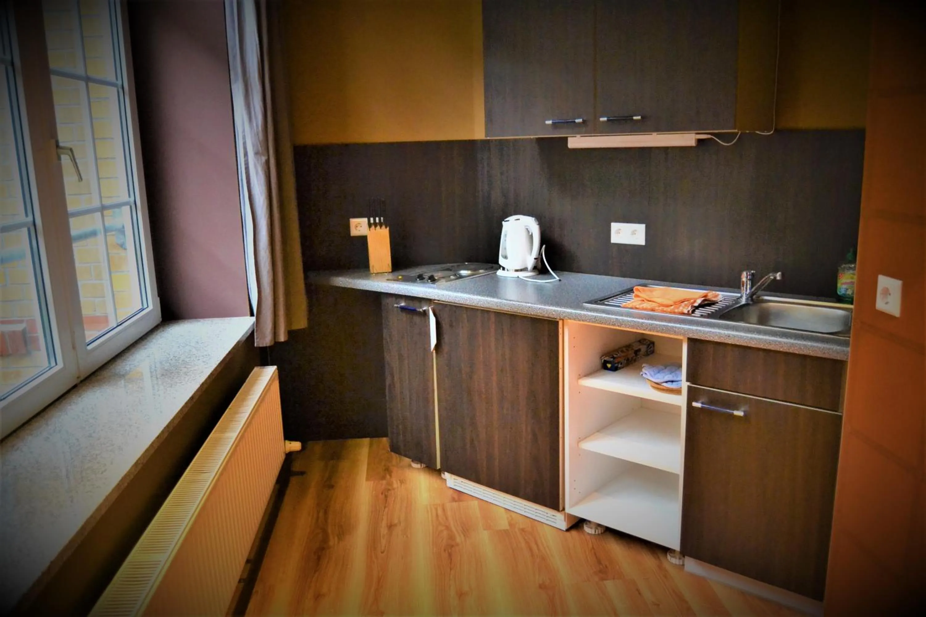 Kitchen or kitchenette in Singer109 Hostel, Hotel & Apartment