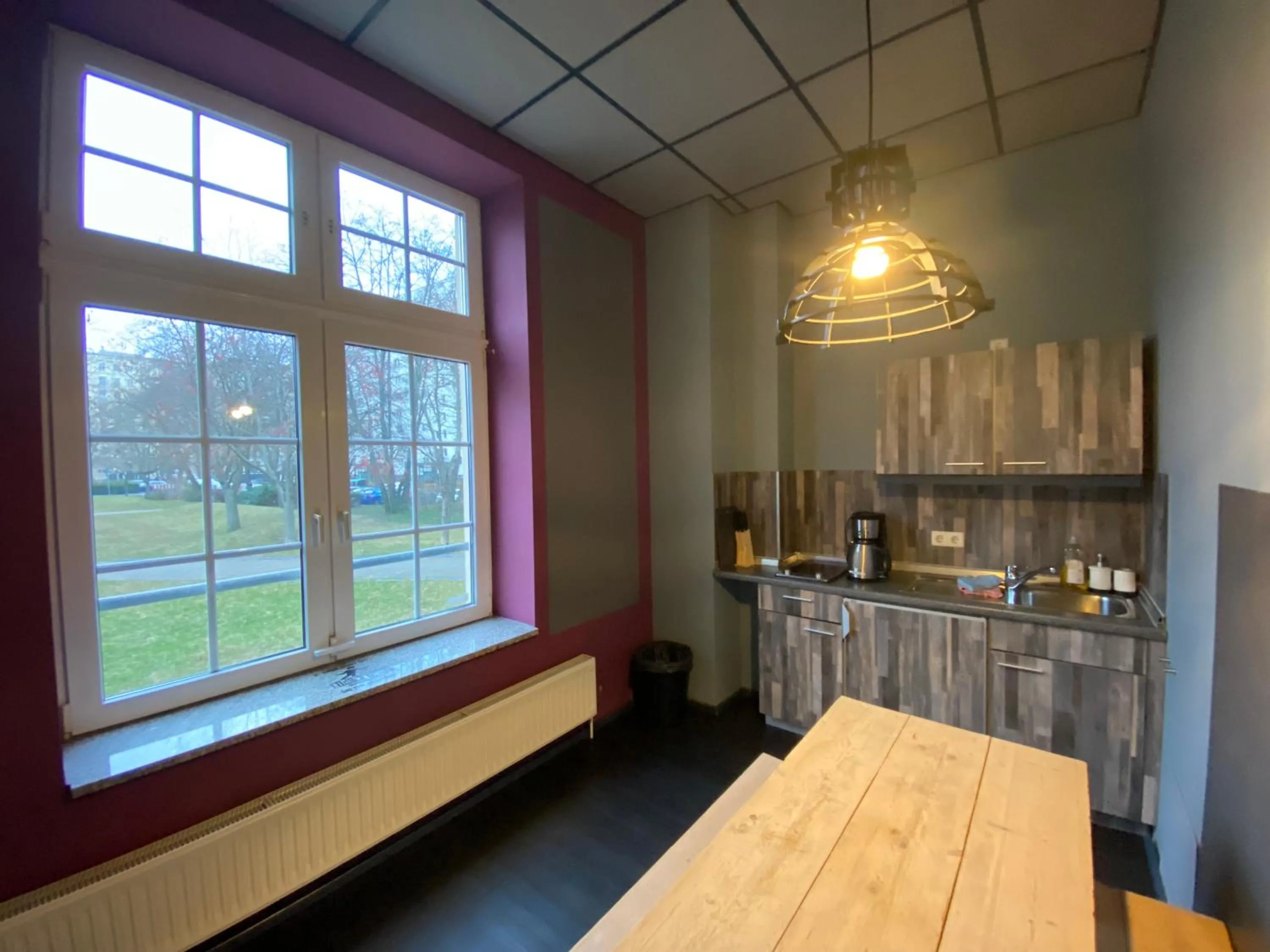 Kitchen or kitchenette in Singer109 Hostel, Hotel & Apartment