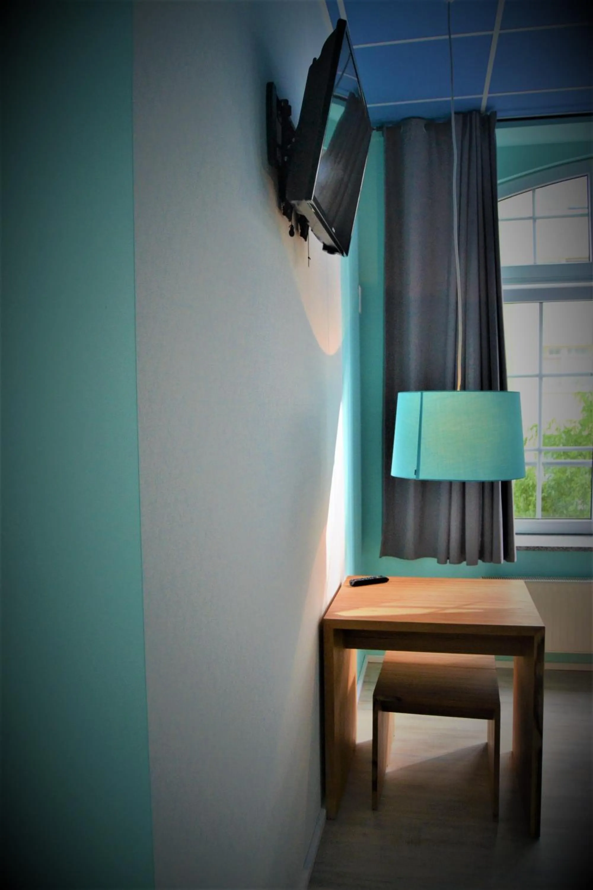 TV and multimedia in Singer109 Hostel, Hotel & Apartment