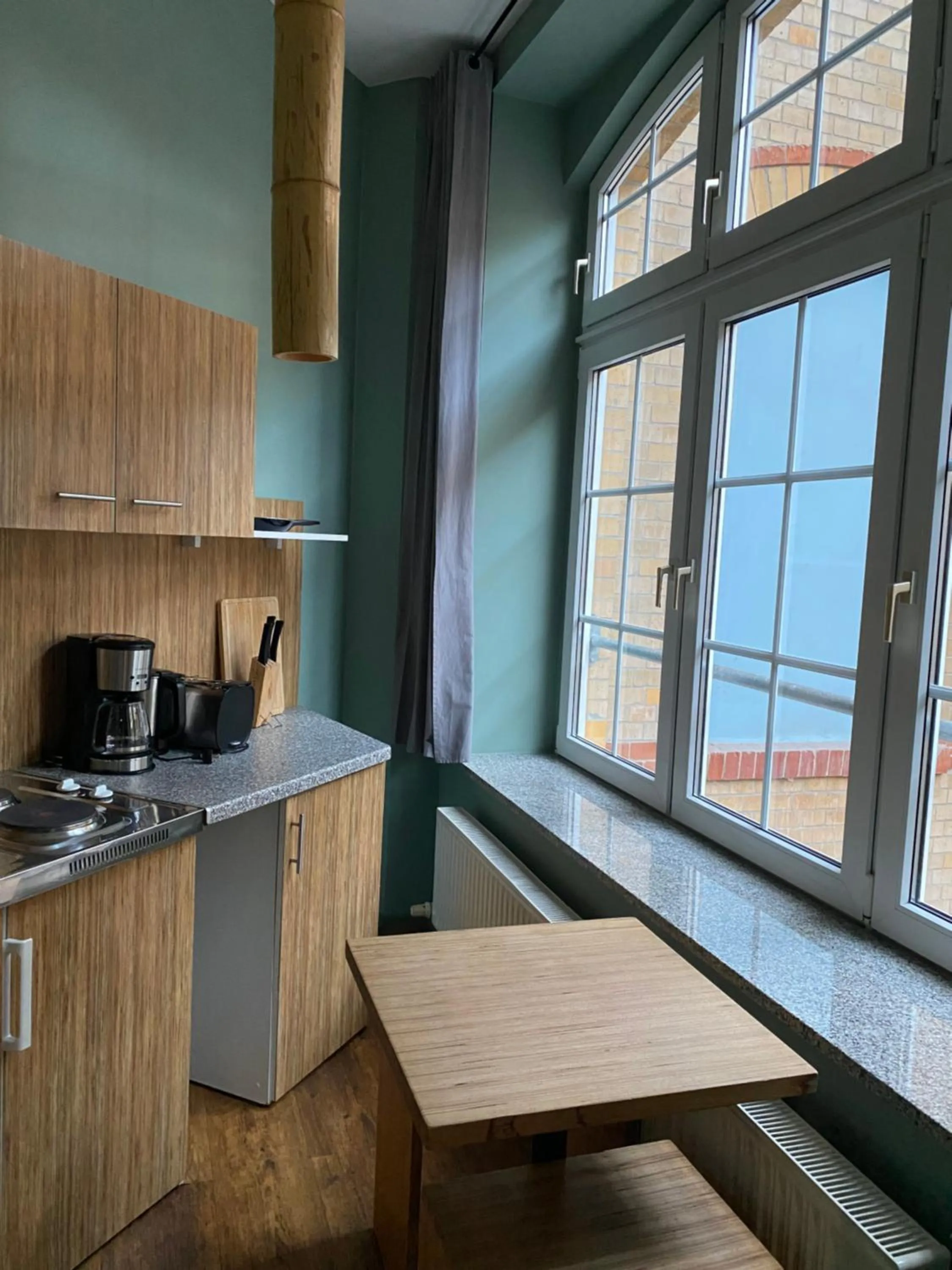 Kitchen or kitchenette in Singer109 Hostel, Hotel & Apartment