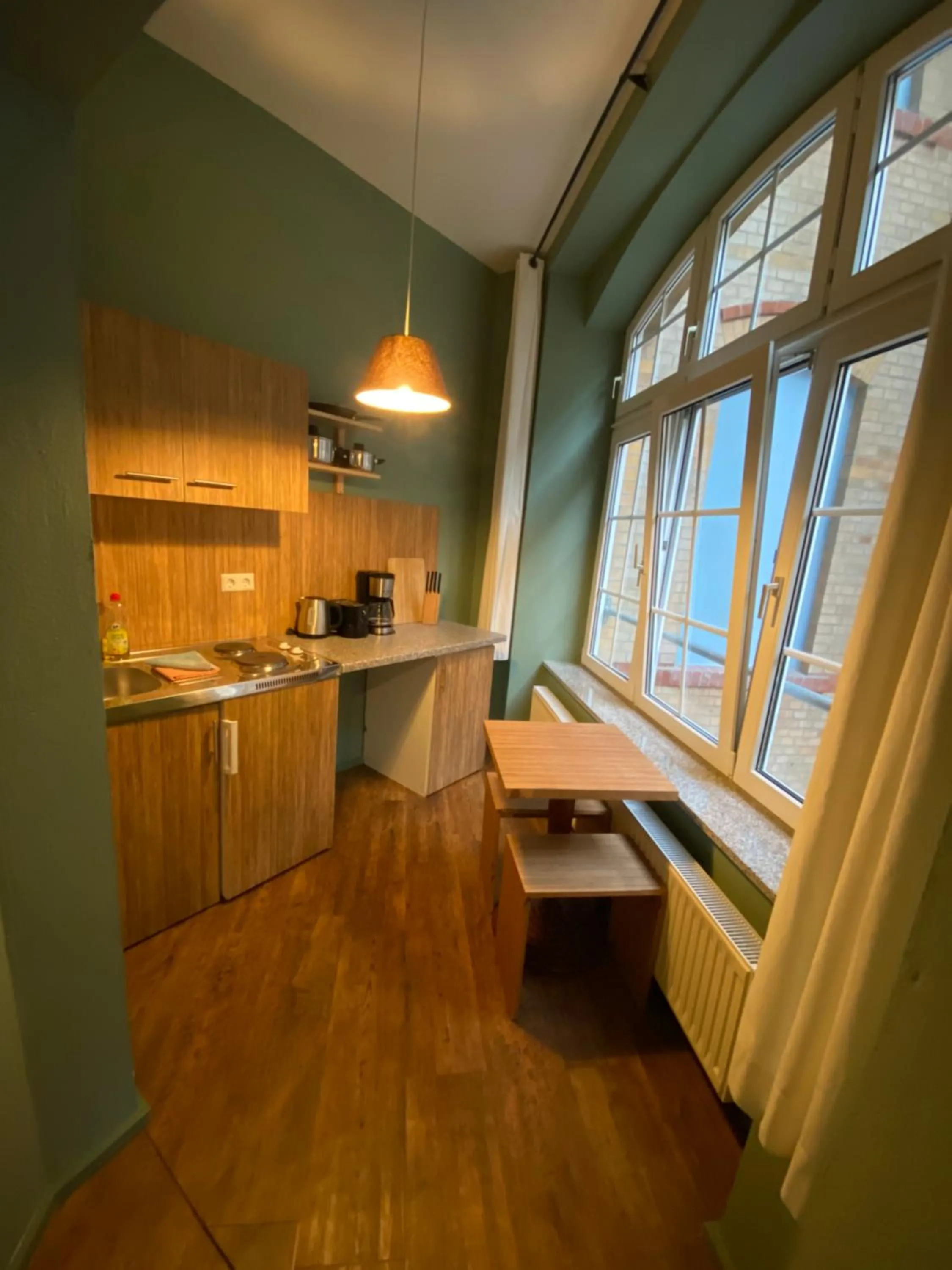 Kitchen or kitchenette in Singer109 Hostel, Hotel & Apartment
