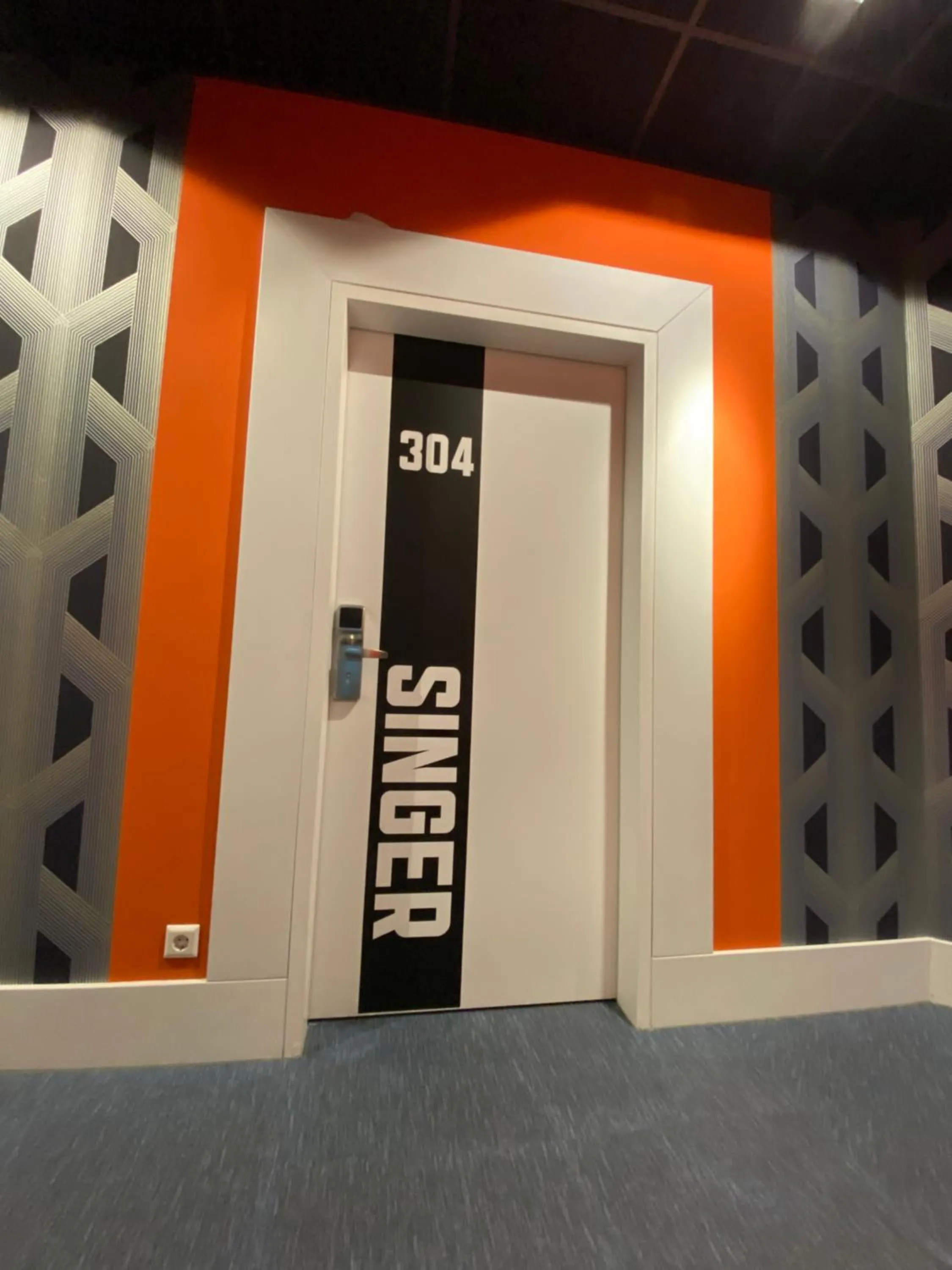 Property logo or sign in Singer109 Hostel, Hotel & Apartment