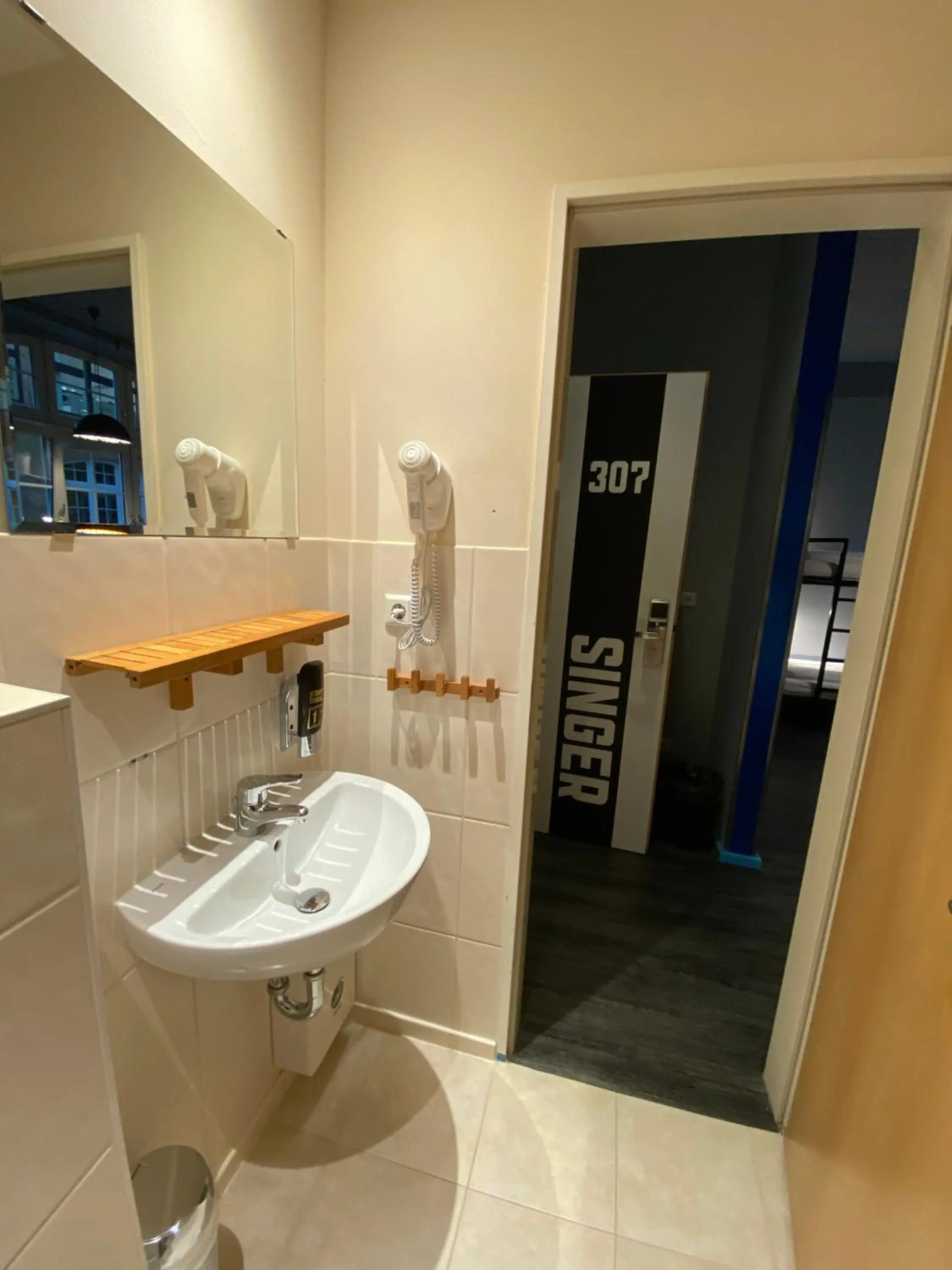 Bathroom in Singer109 Hostel, Hotel & Apartment