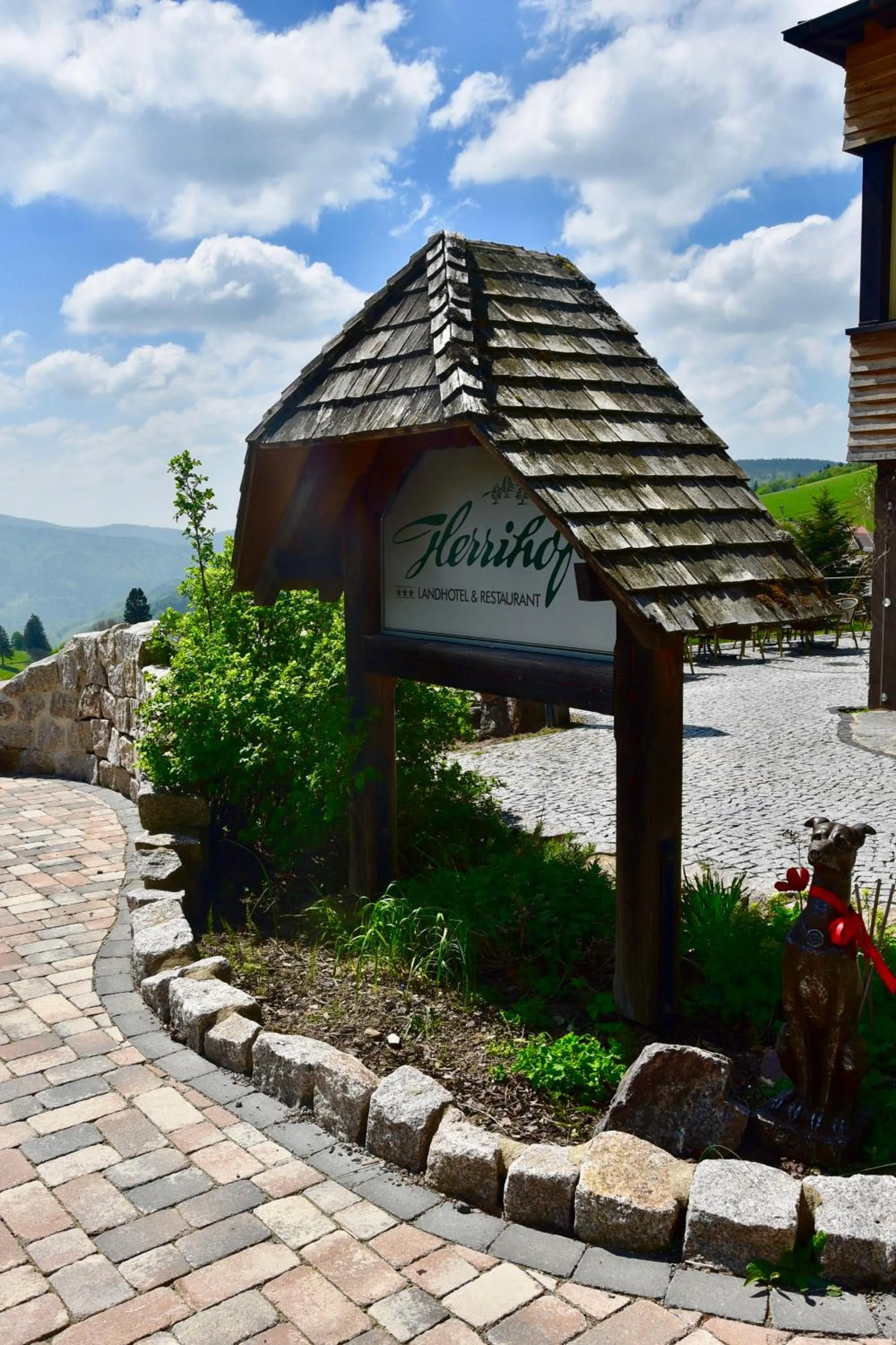 Property logo or sign in Hotel & Chalets Herrihof