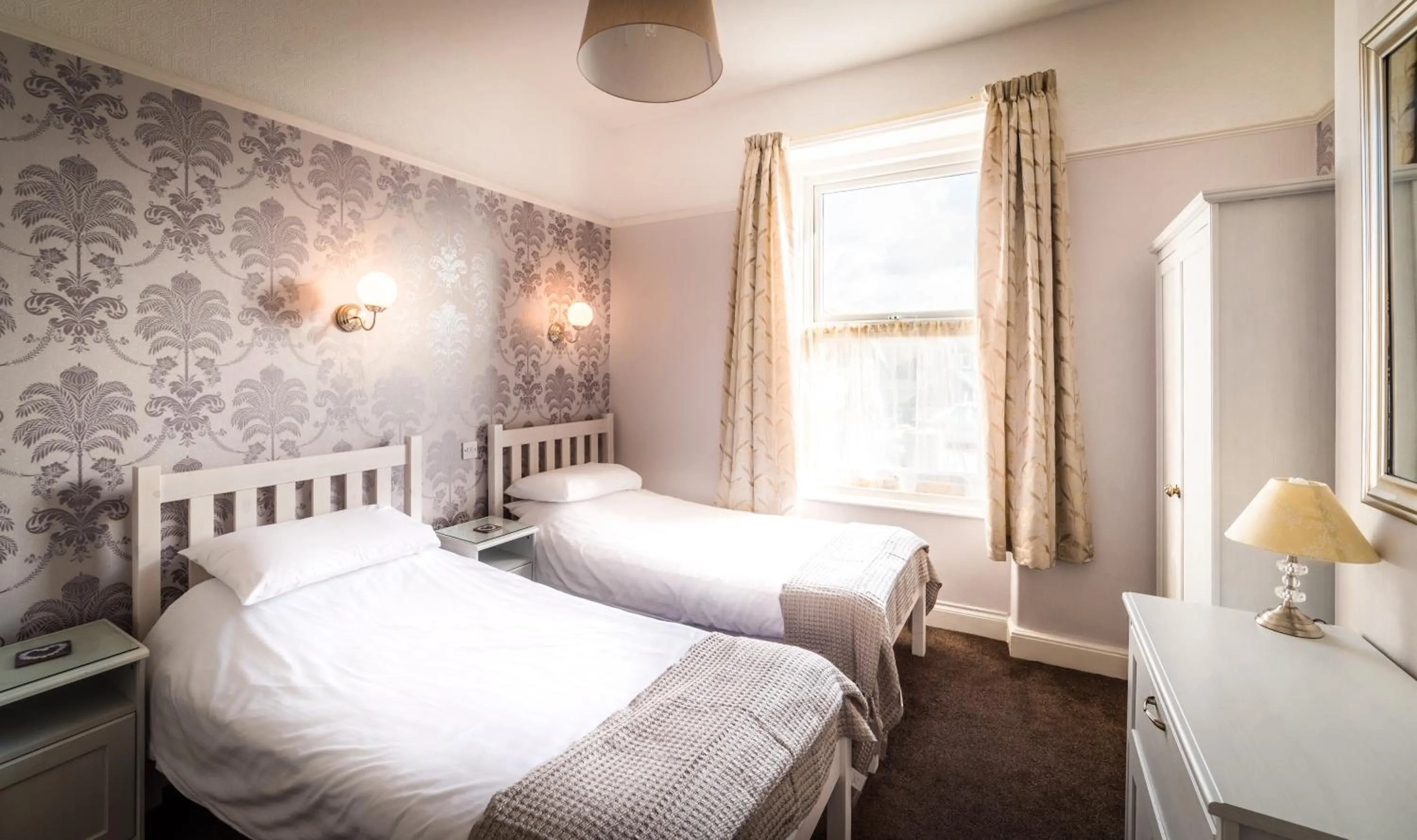 Bed in The Grafton Guest House