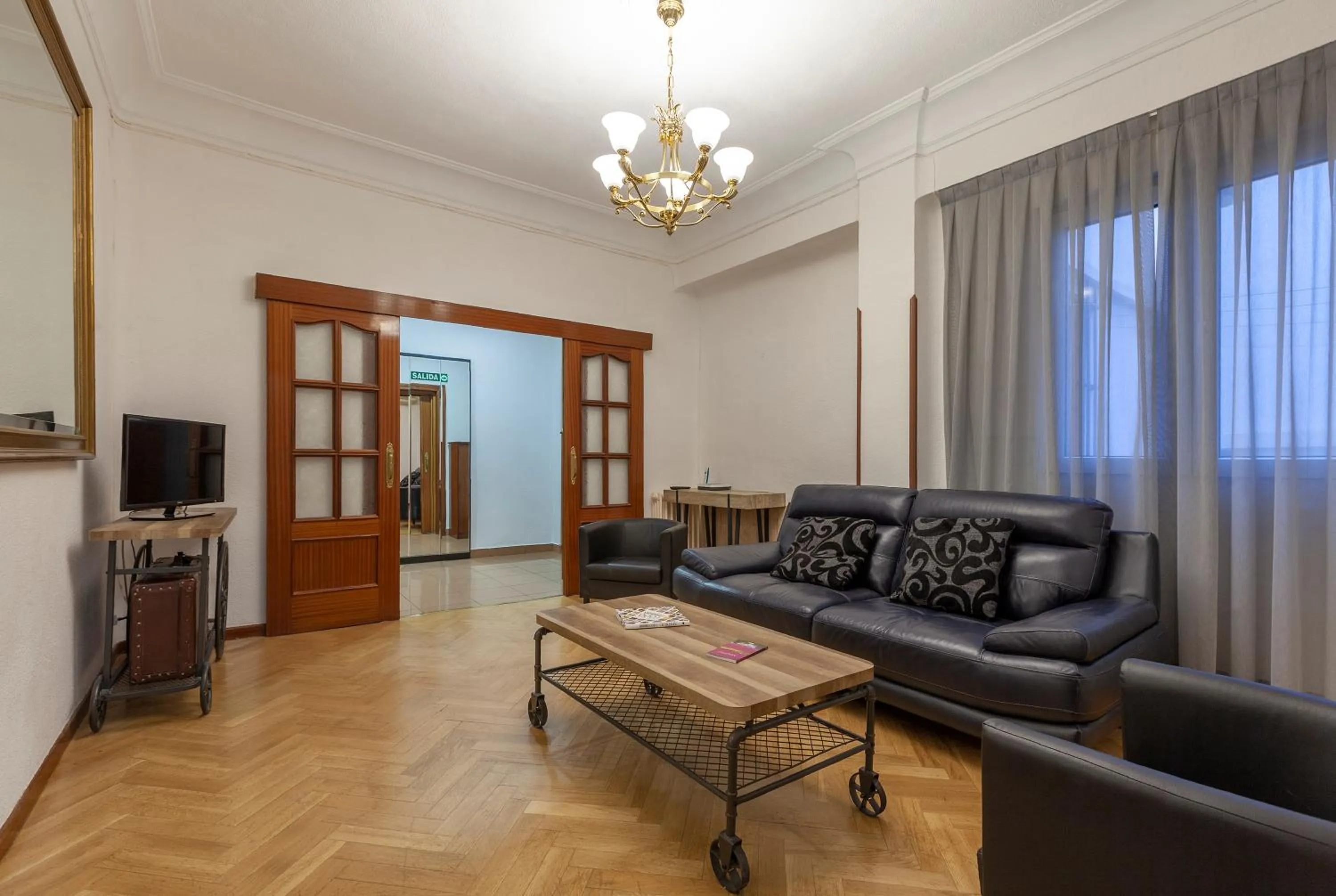 Communal lounge/ TV room in Hostal María Luisa