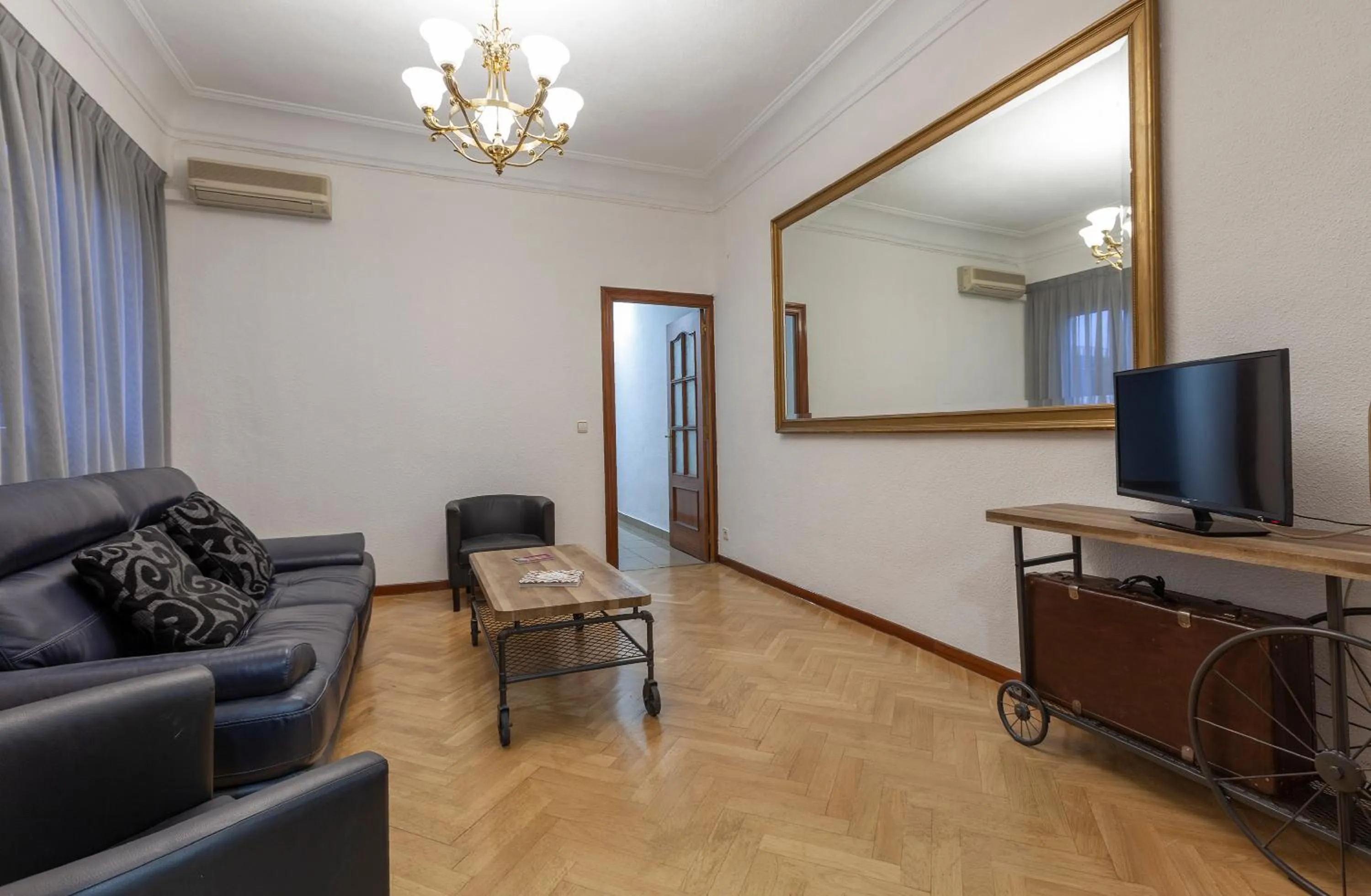 Communal lounge/ TV room in Hostal María Luisa