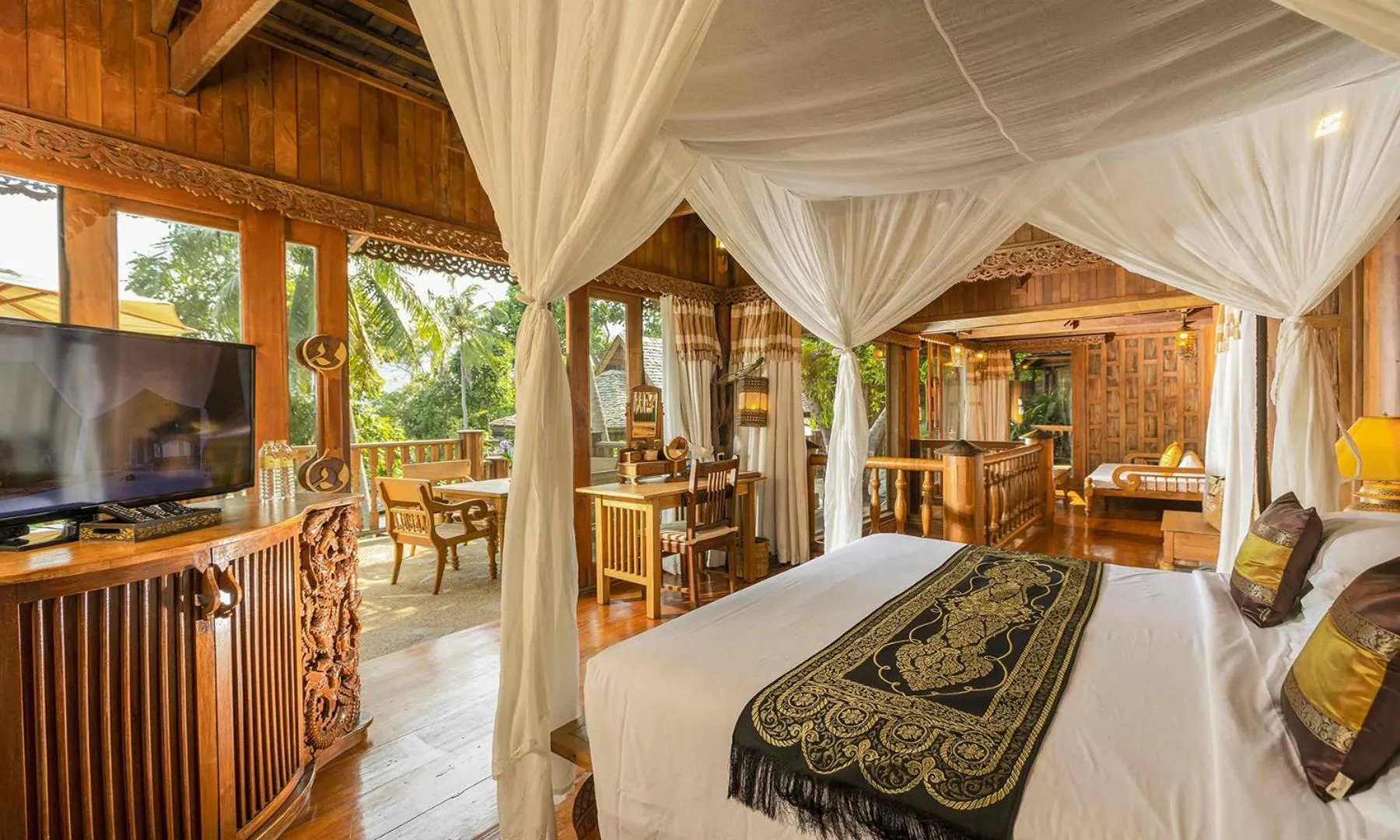 Bed in Santhiya Koh Phangan Resort and Spa