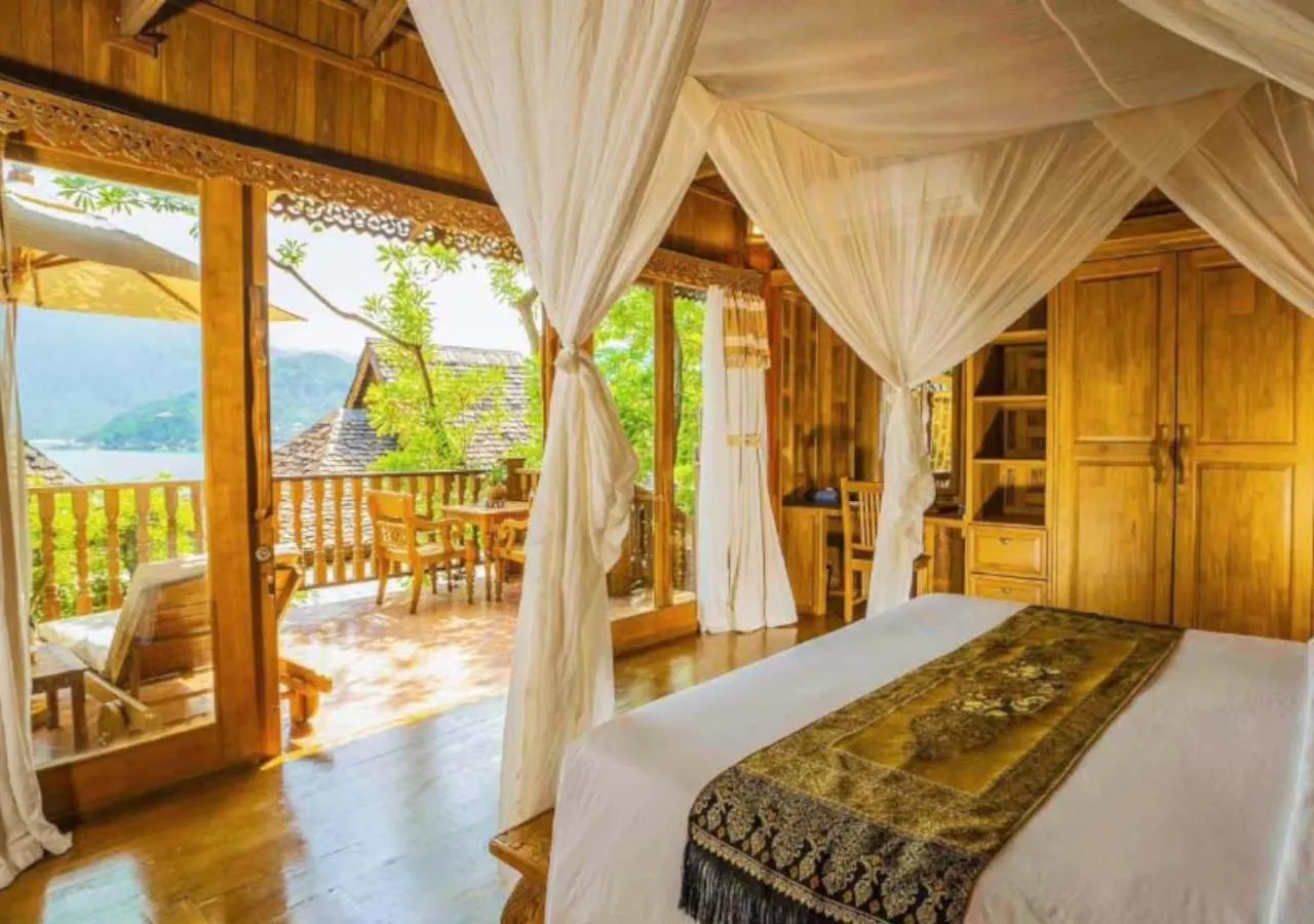 Bed in Santhiya Koh Phangan Resort and Spa