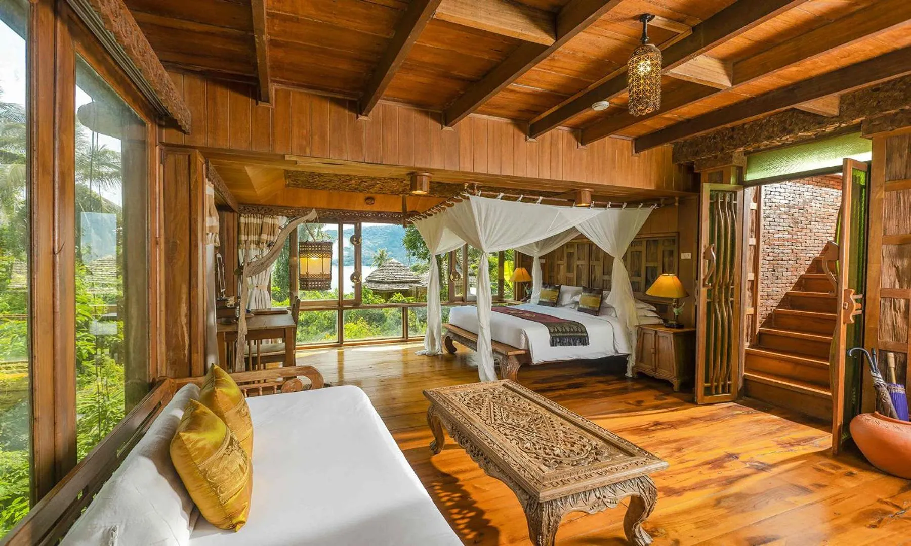 Bed in Santhiya Koh Phangan Resort and Spa