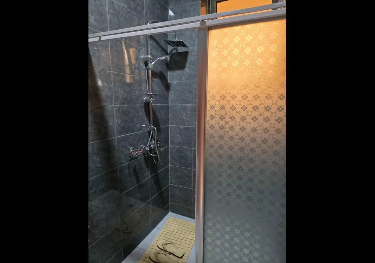 Bathroom in Romalo Hotel & Apartments