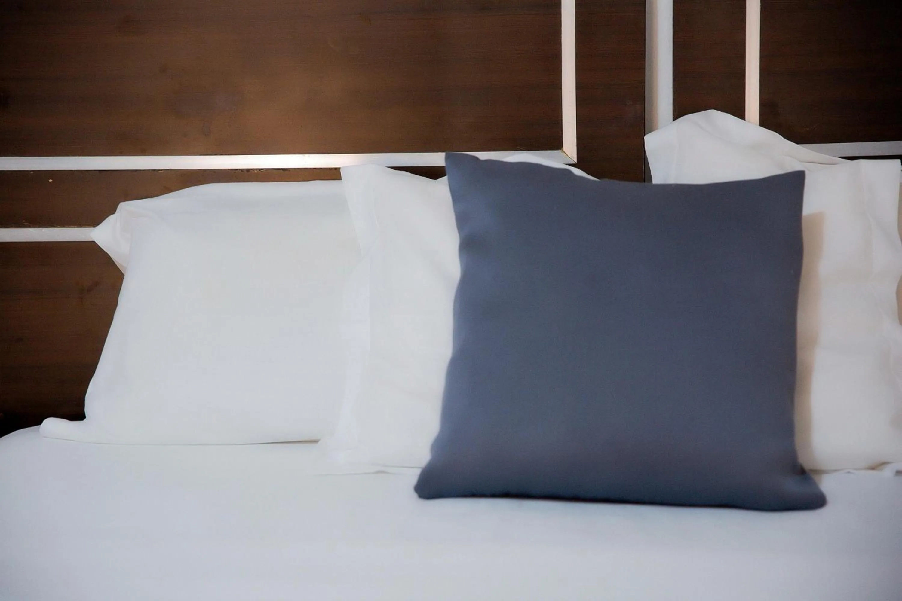 Bed in Romalo Hotel & Apartments