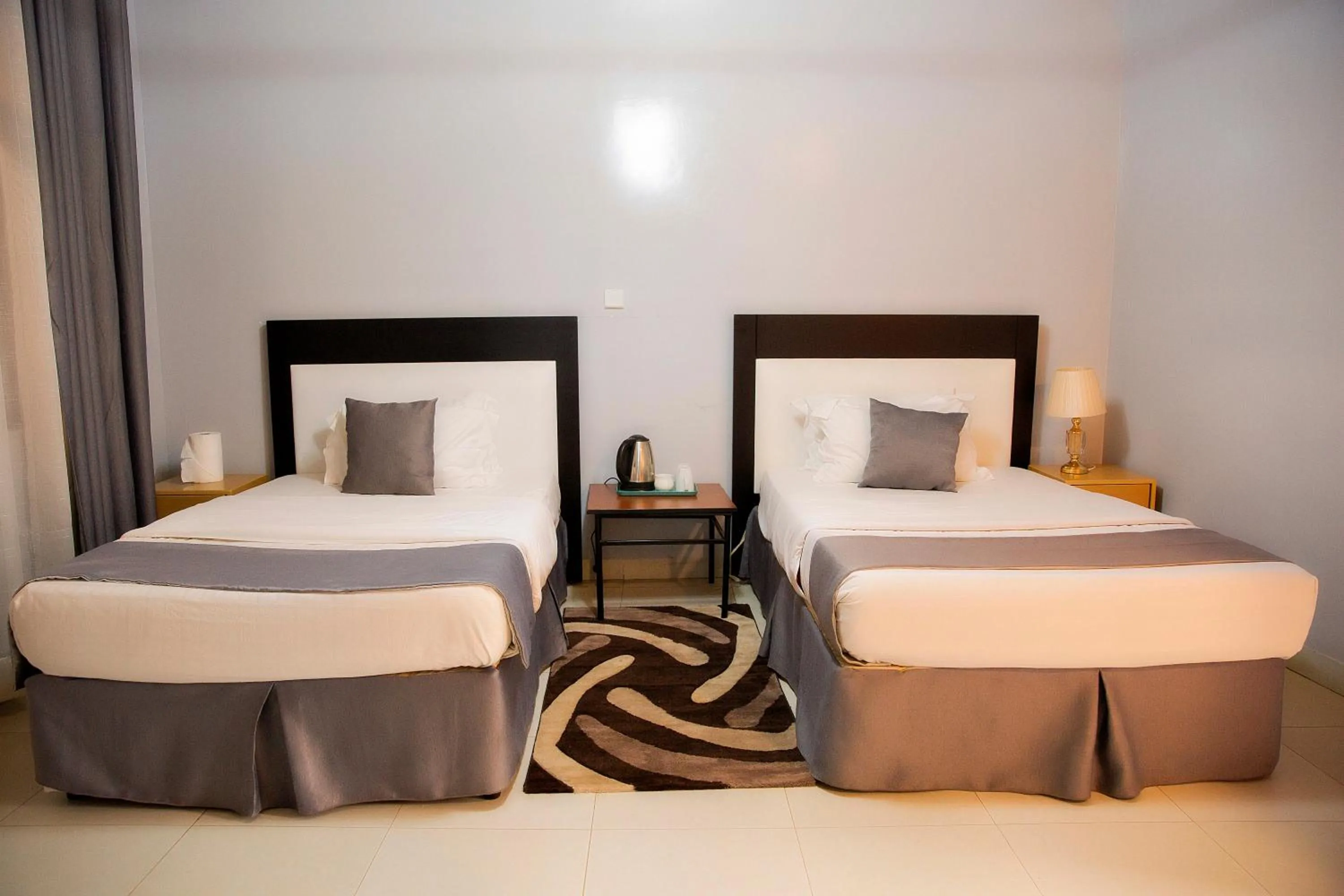 Bed in Romalo Hotel & Apartments