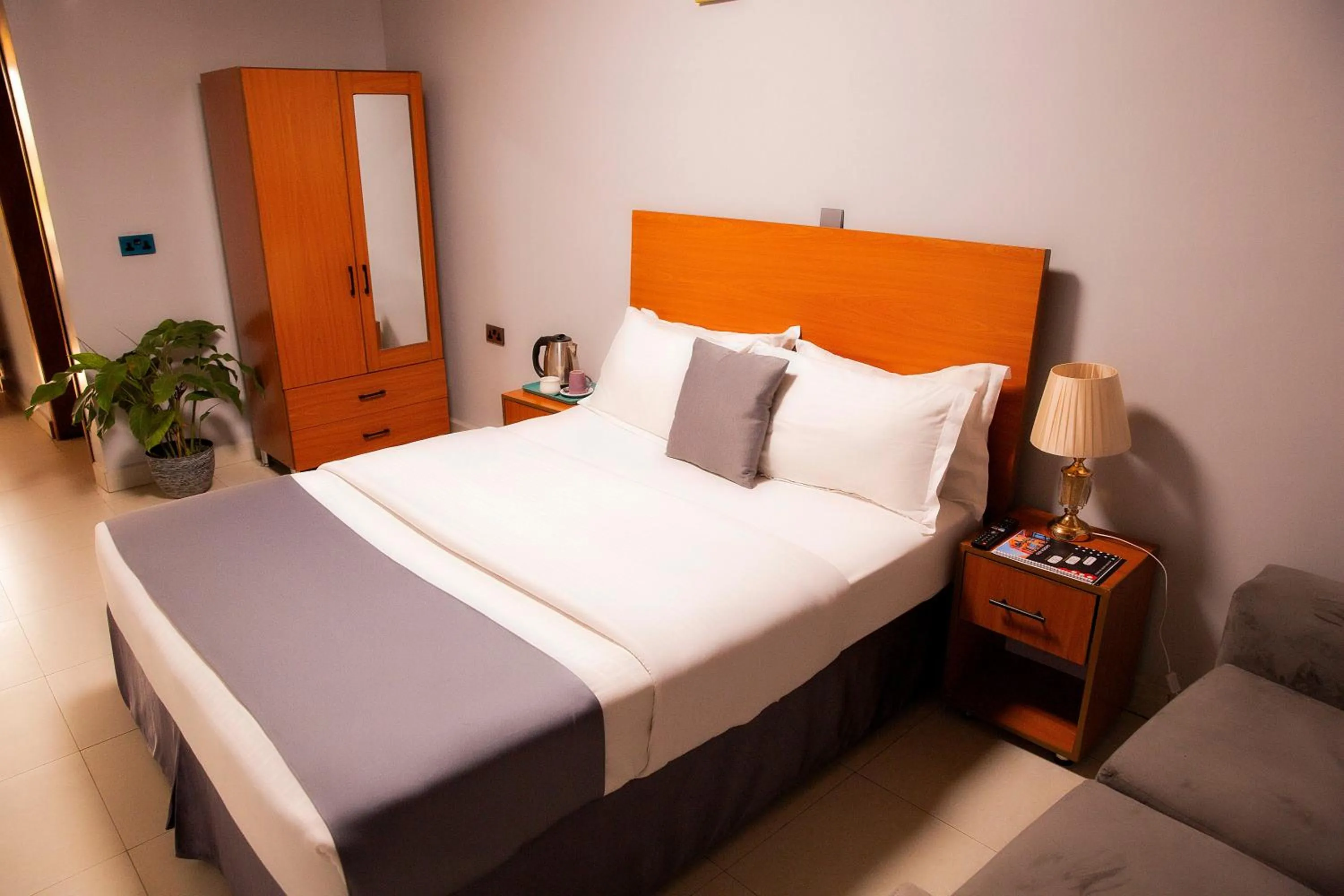 Bed in Romalo Hotel & Apartments