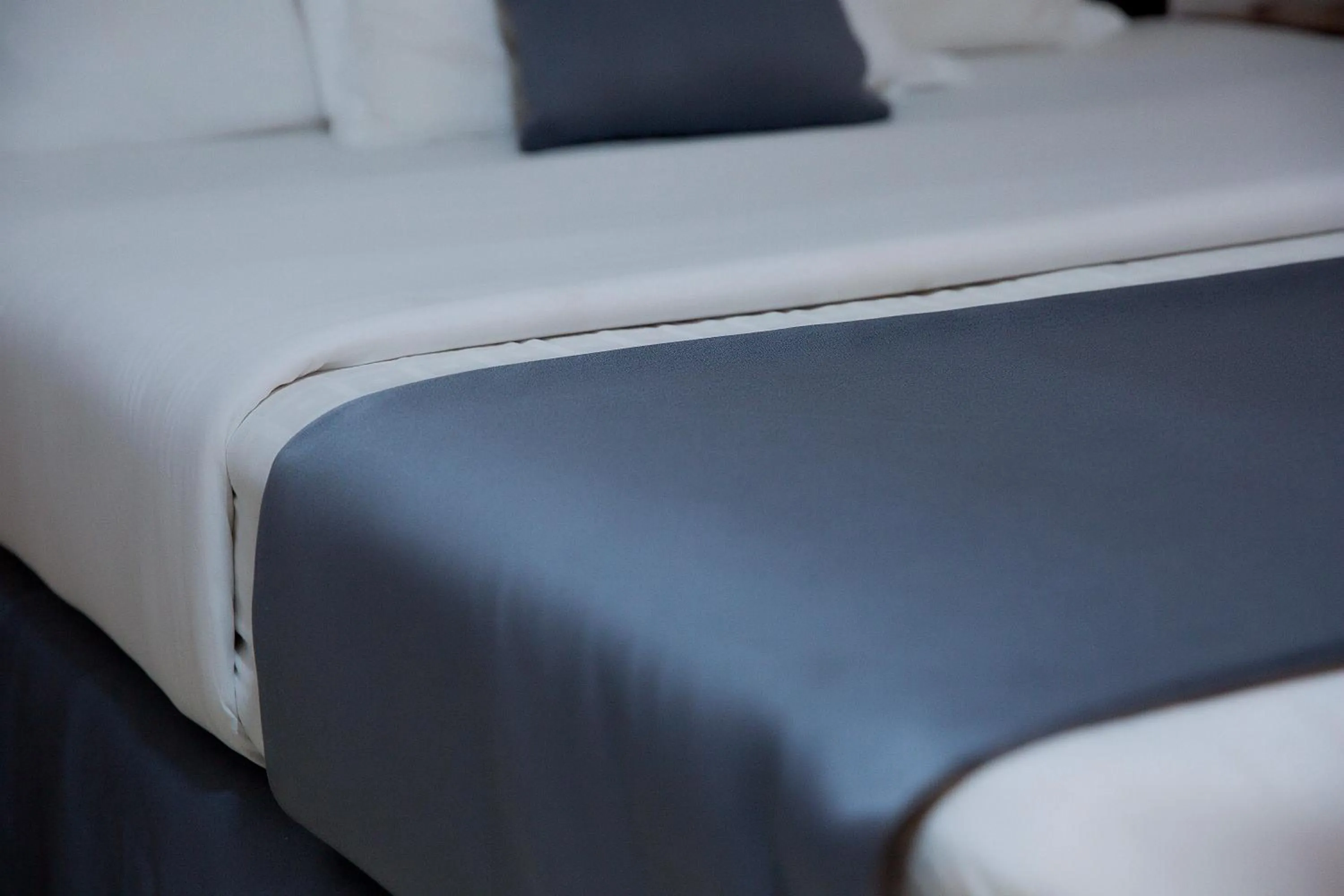 Bed in Romalo Hotel & Apartments