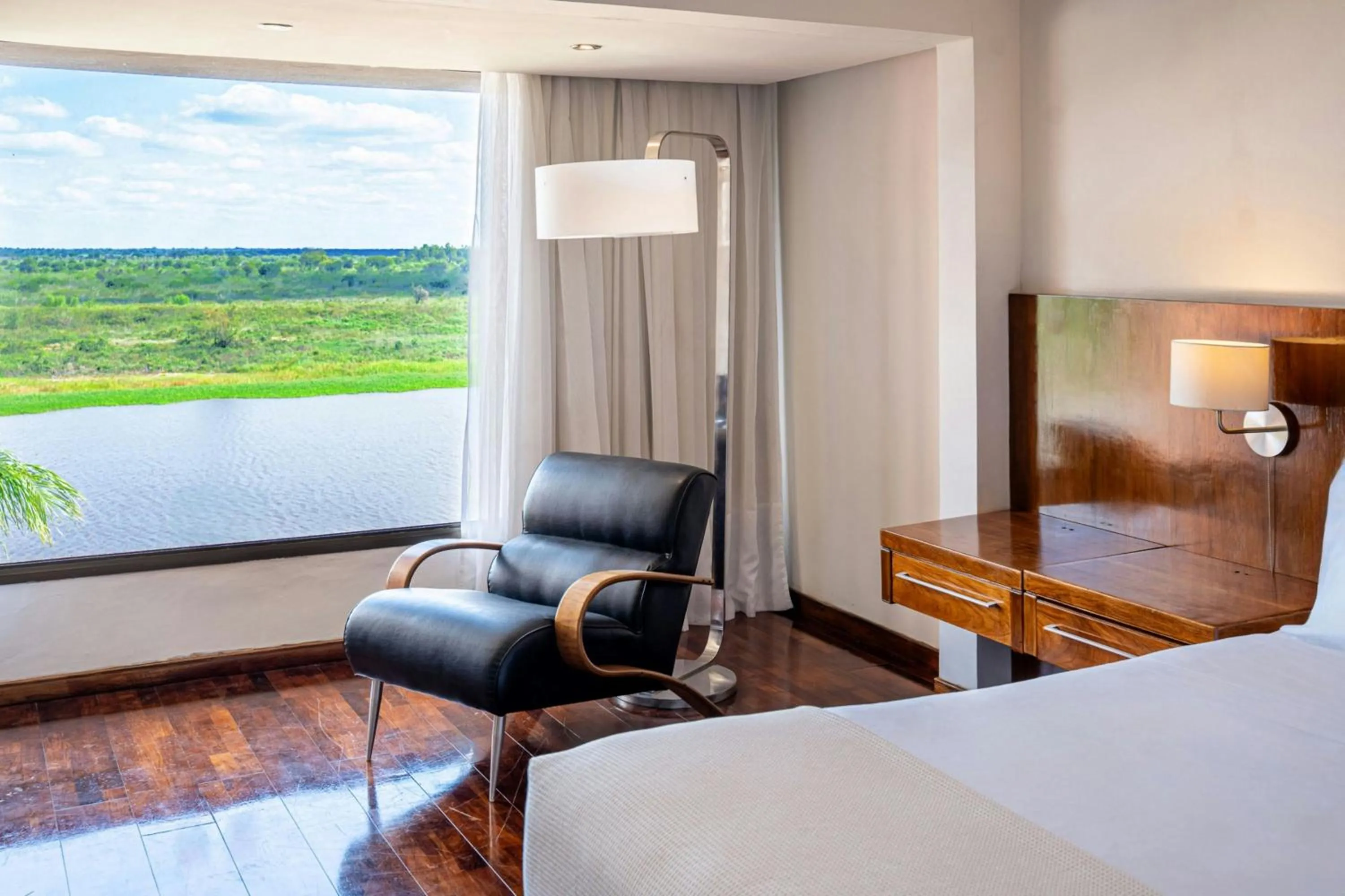 Photo of the whole room, Bed in Yacht & Golf Club Paraguayo, a Tribute Portfolio Resort